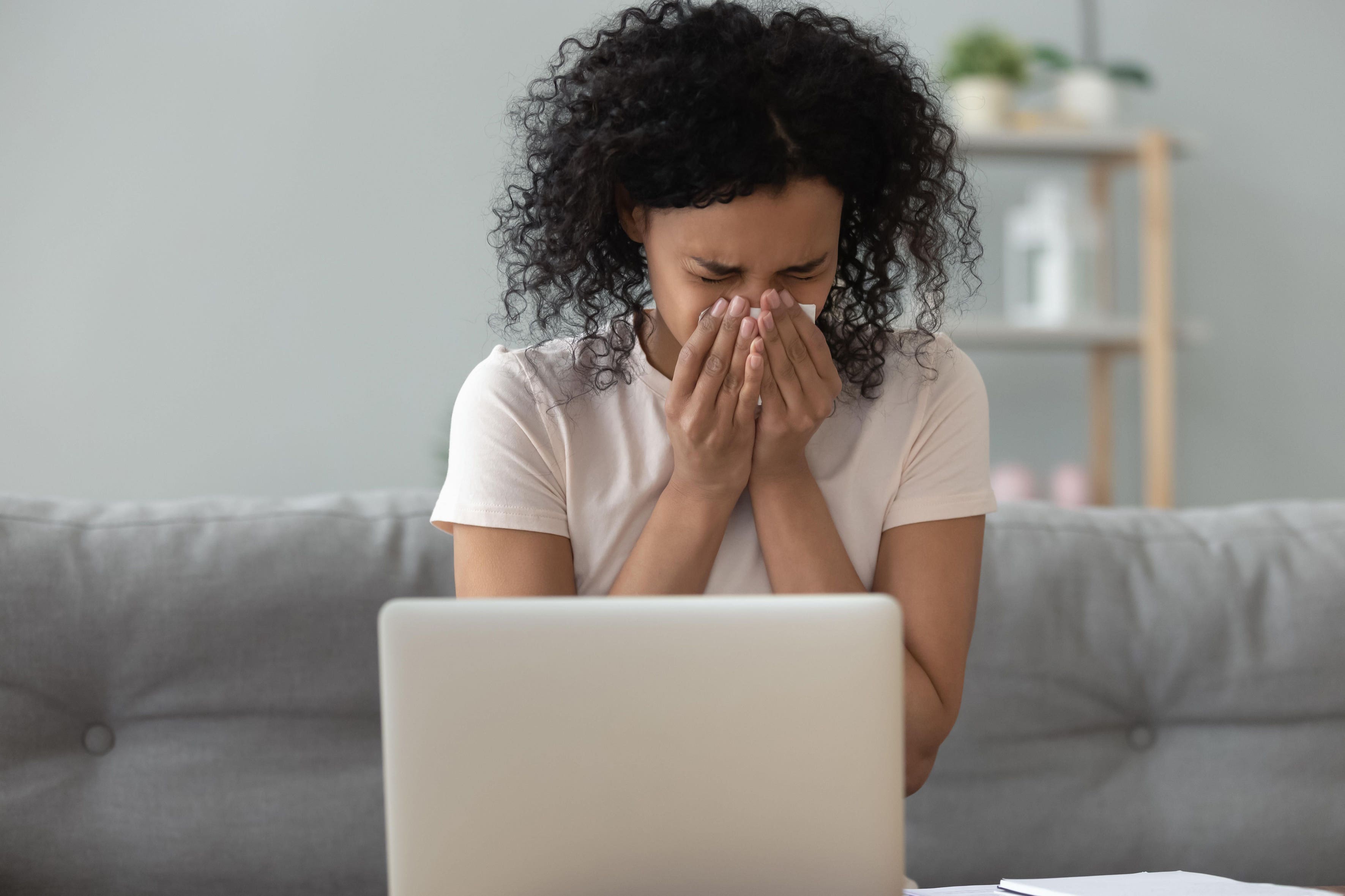 Airborne allergens in the home can cause sneezing and sore, itchy eyes (Alamy/PA)