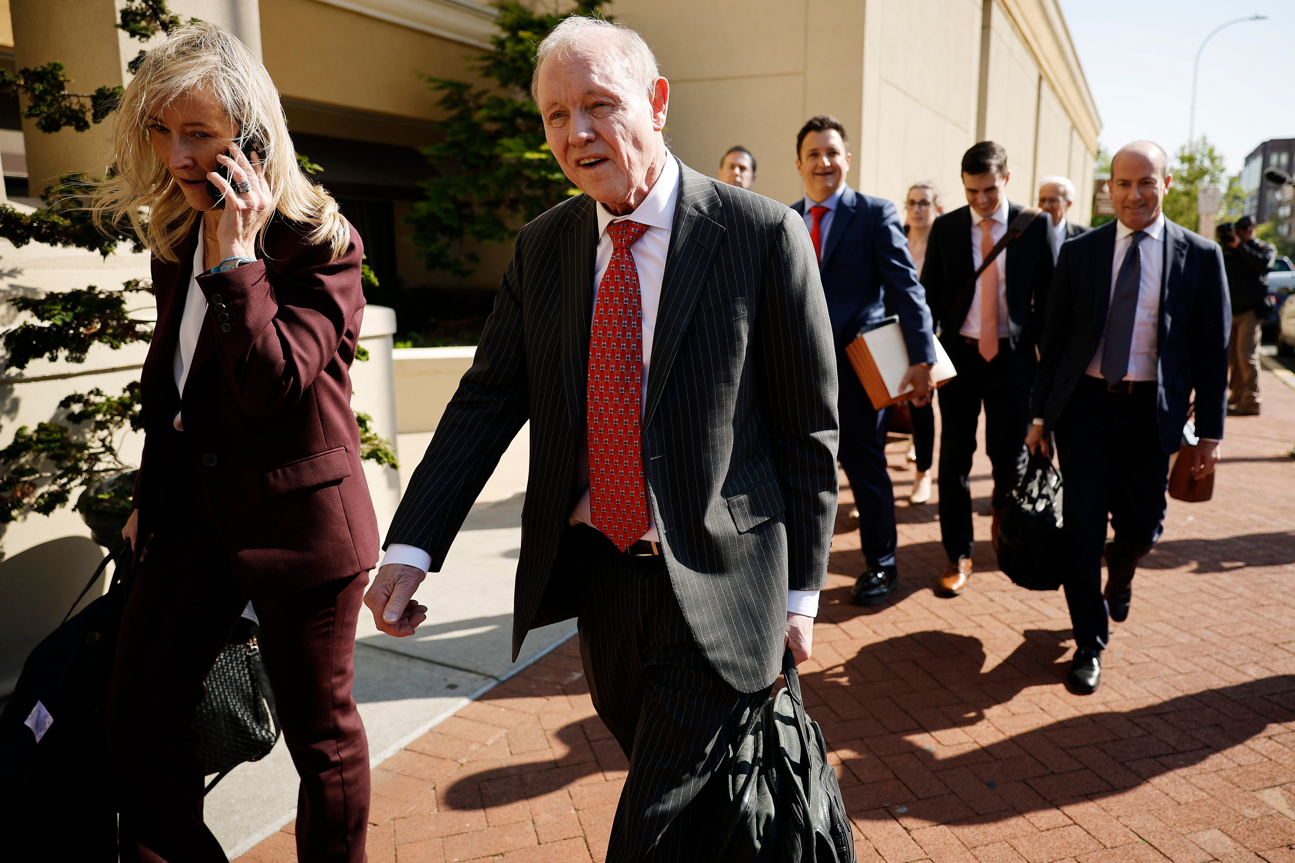 Members of the legal team for Fox News leave a Delaware courthouse on 18 April after a settlement with Dominion Voting Systems was announced.