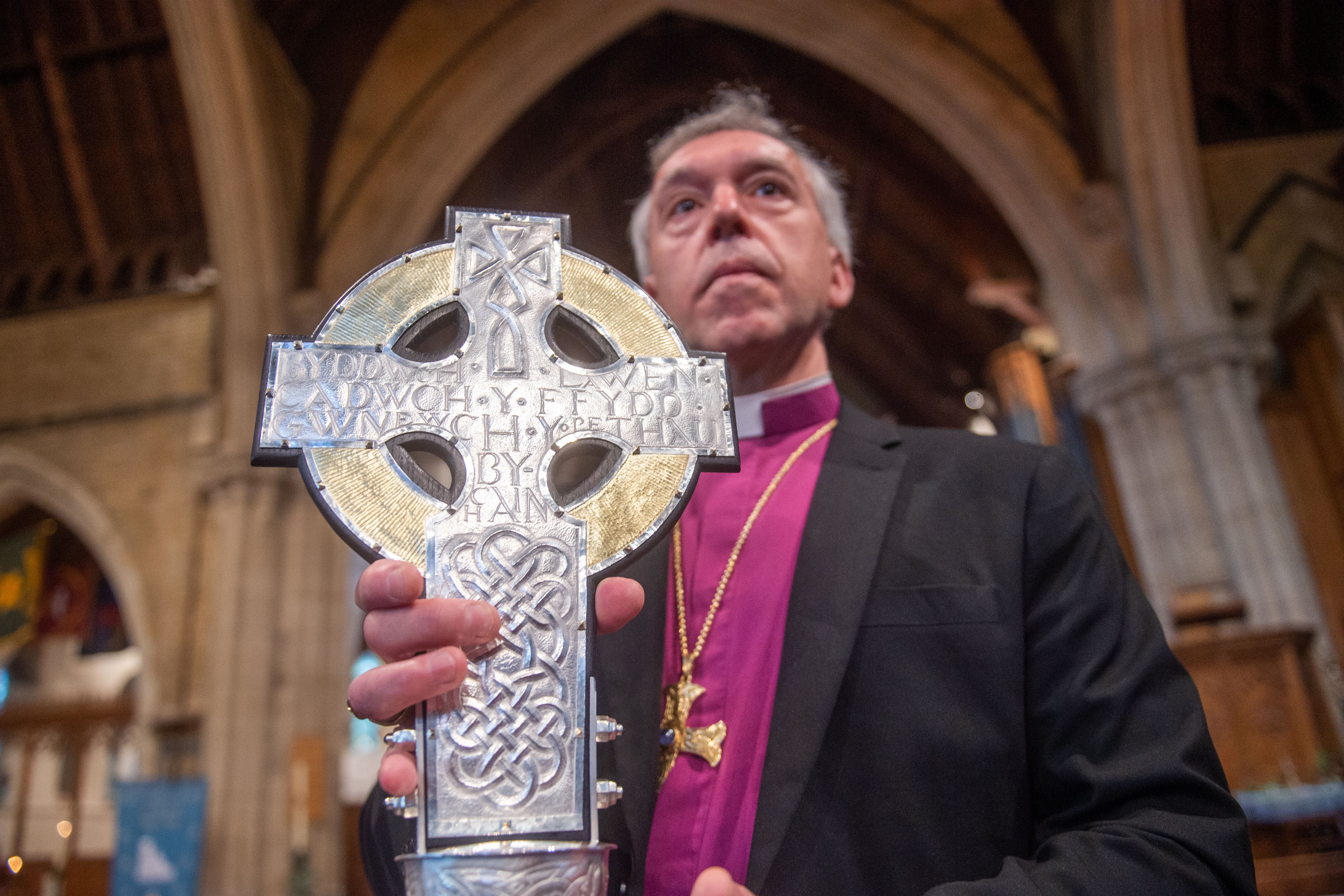 Archbishop of Wales Andrew John with The Cross of Wales (Peter Powell/PA)