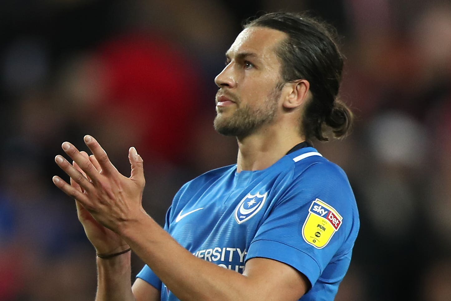 Christian Burgess has gone from League One to the Europa League quarter-finals in three years (Simon Cooper/PA)