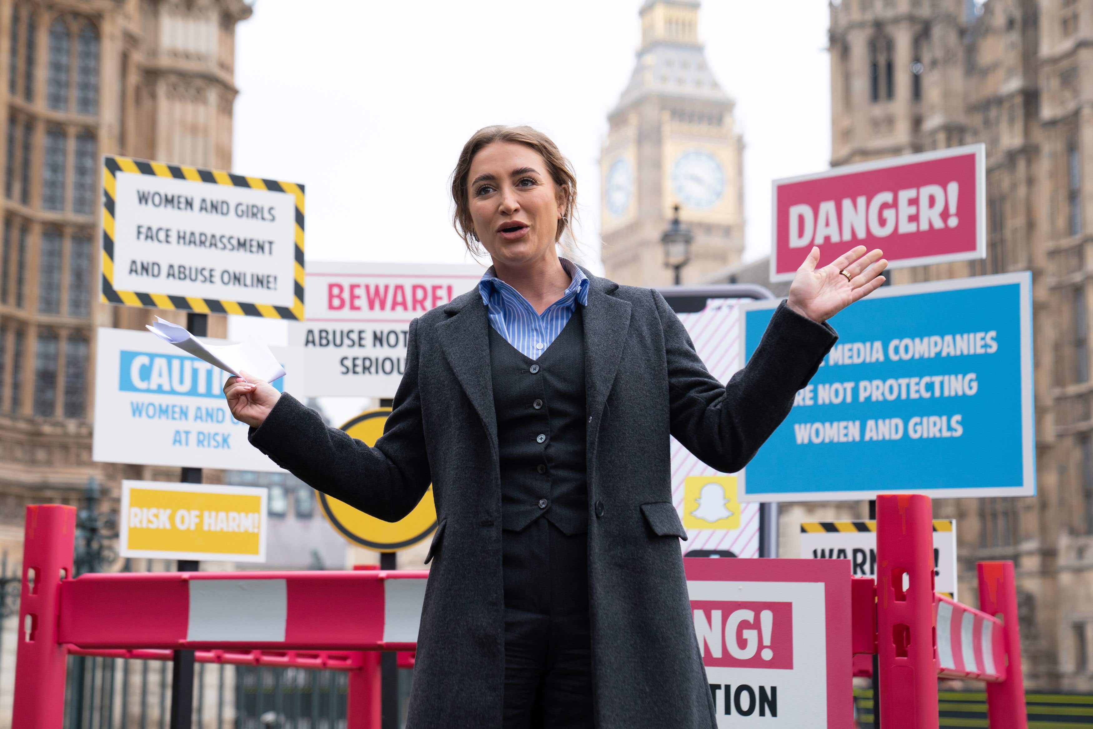 ‘Love Island’ contestant, Georgia Harrison, who was a victim of revenge porn, at a demonstration organised by Refuge outside the Houses of Parliament, Westminster (Stefan Rousseau/PA)