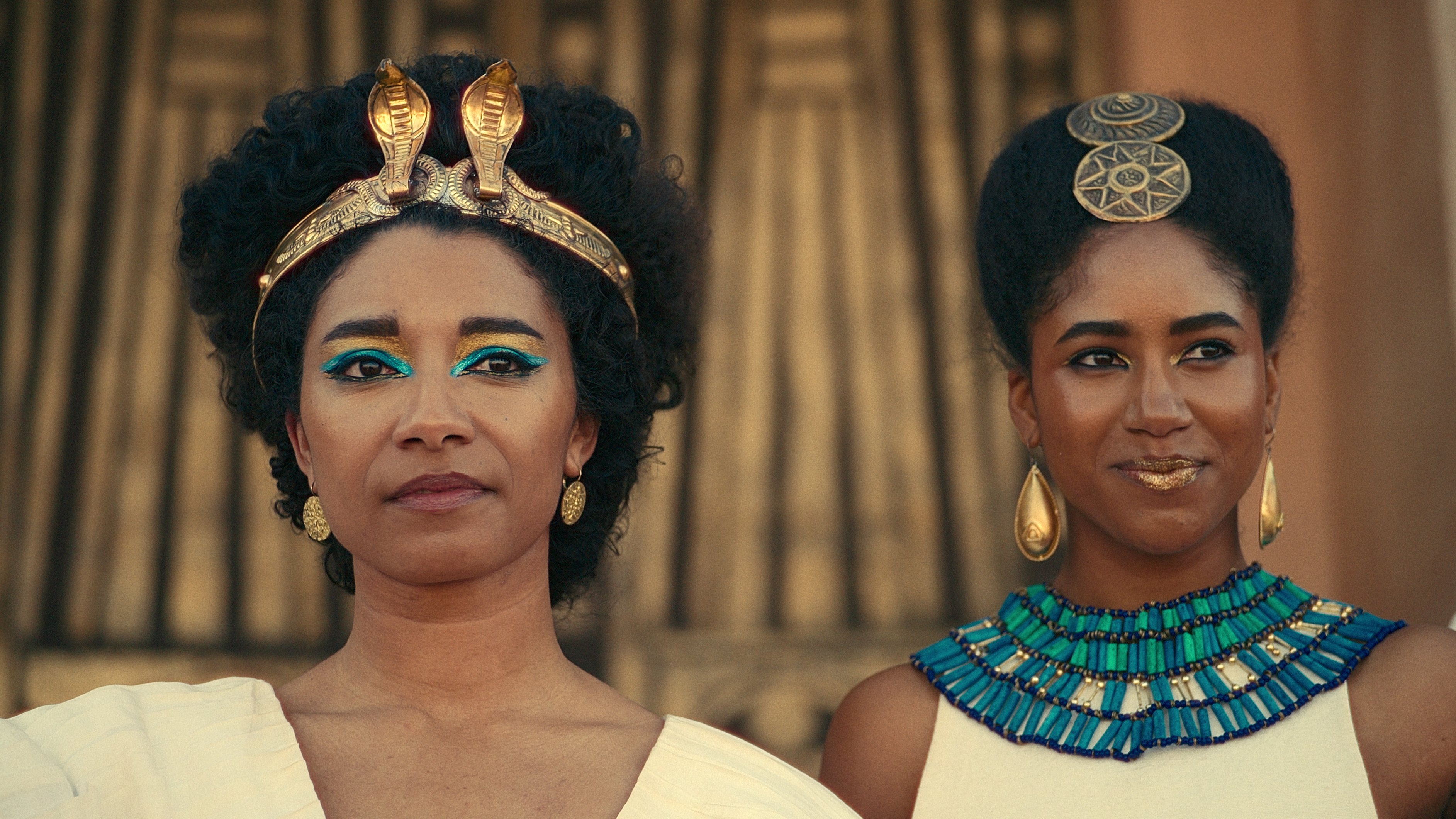 James (left) as Cleopatra