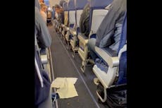 Flight attendant won’t let plane leave until passengers clean up mess dropped in the aisle