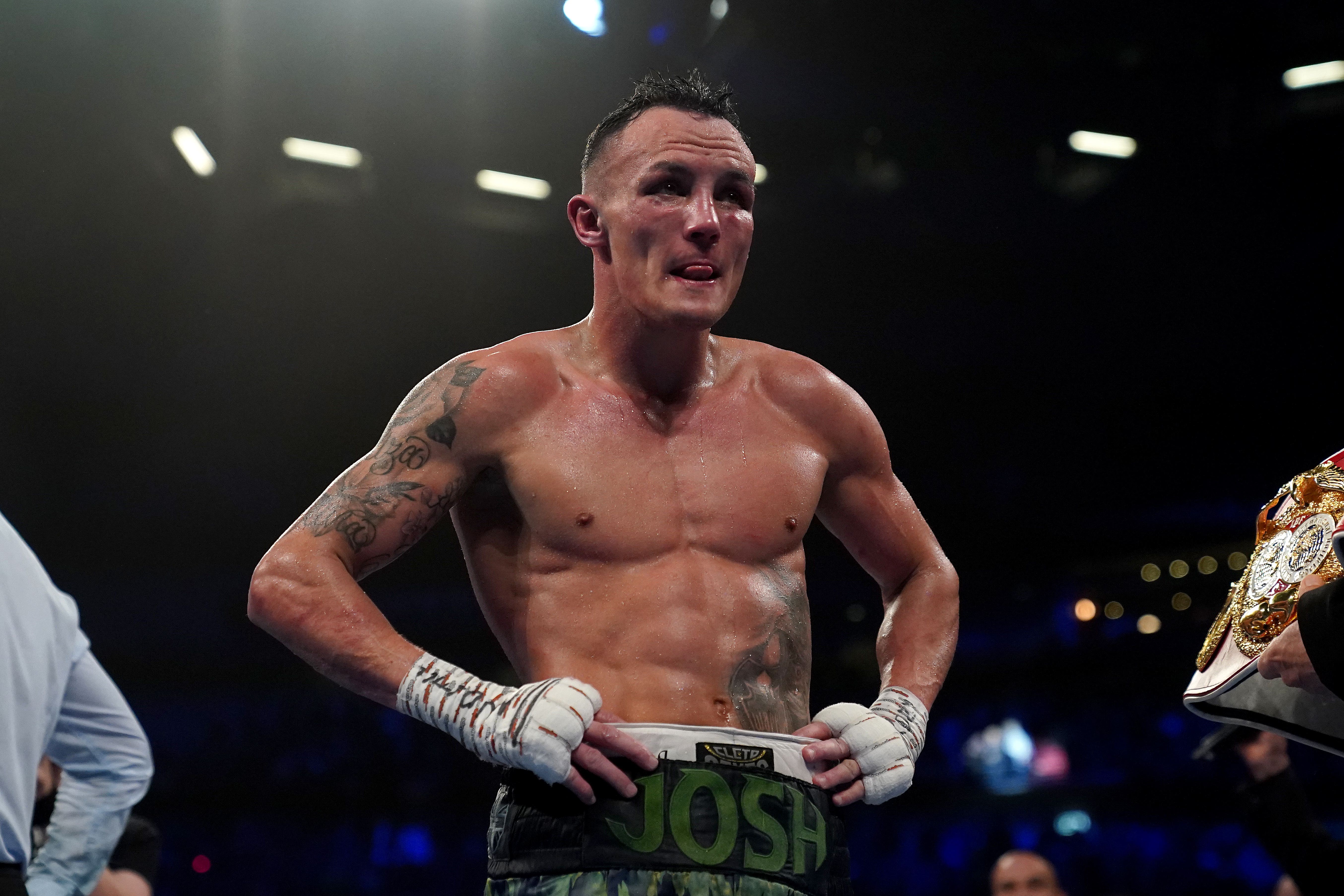 Josh Warrington has not given up on ruling the featherweight division (Tim Goode/PA)