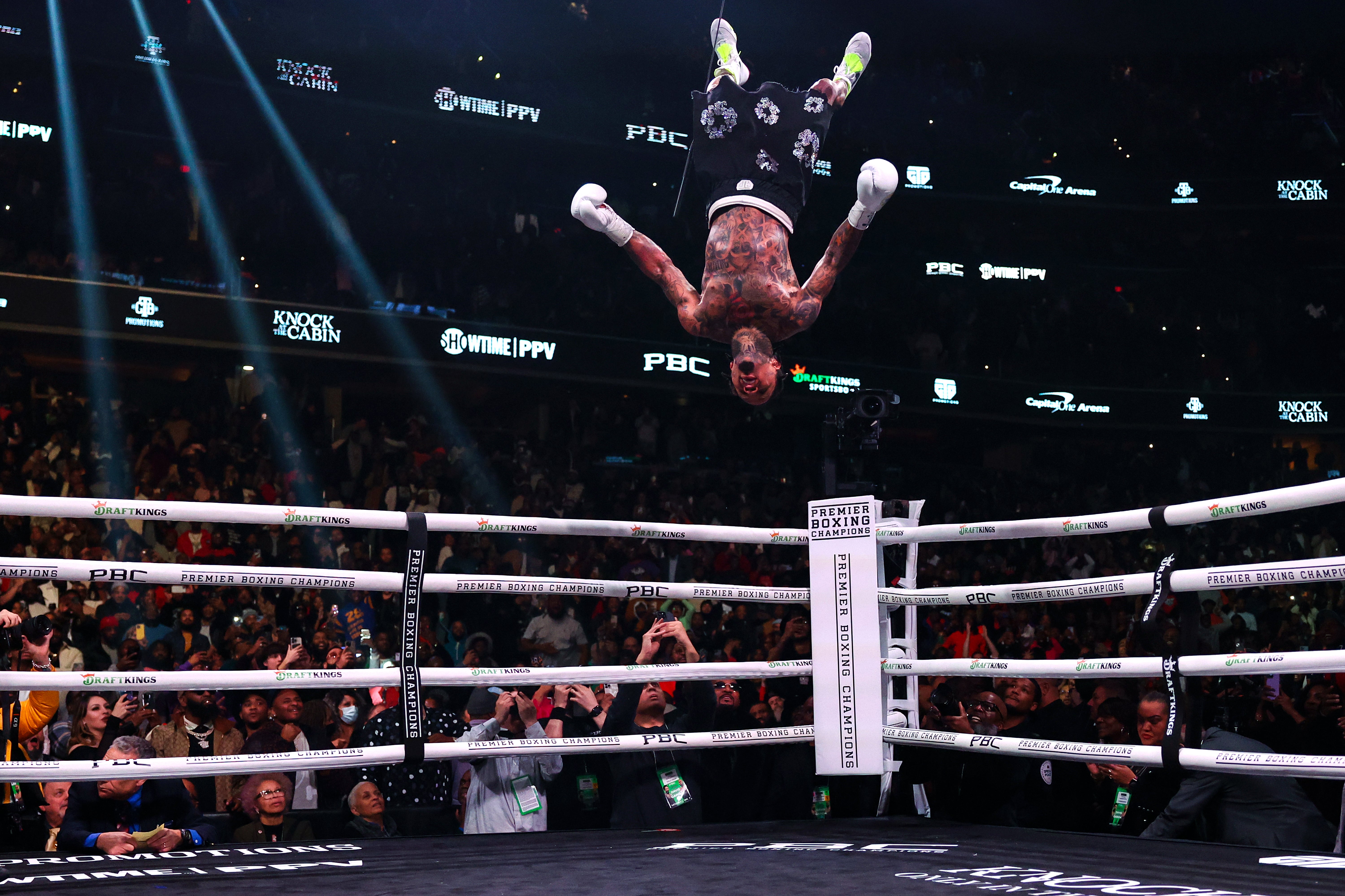 Davis celebrates his stoppage victory over Hector Luis Garcia in style