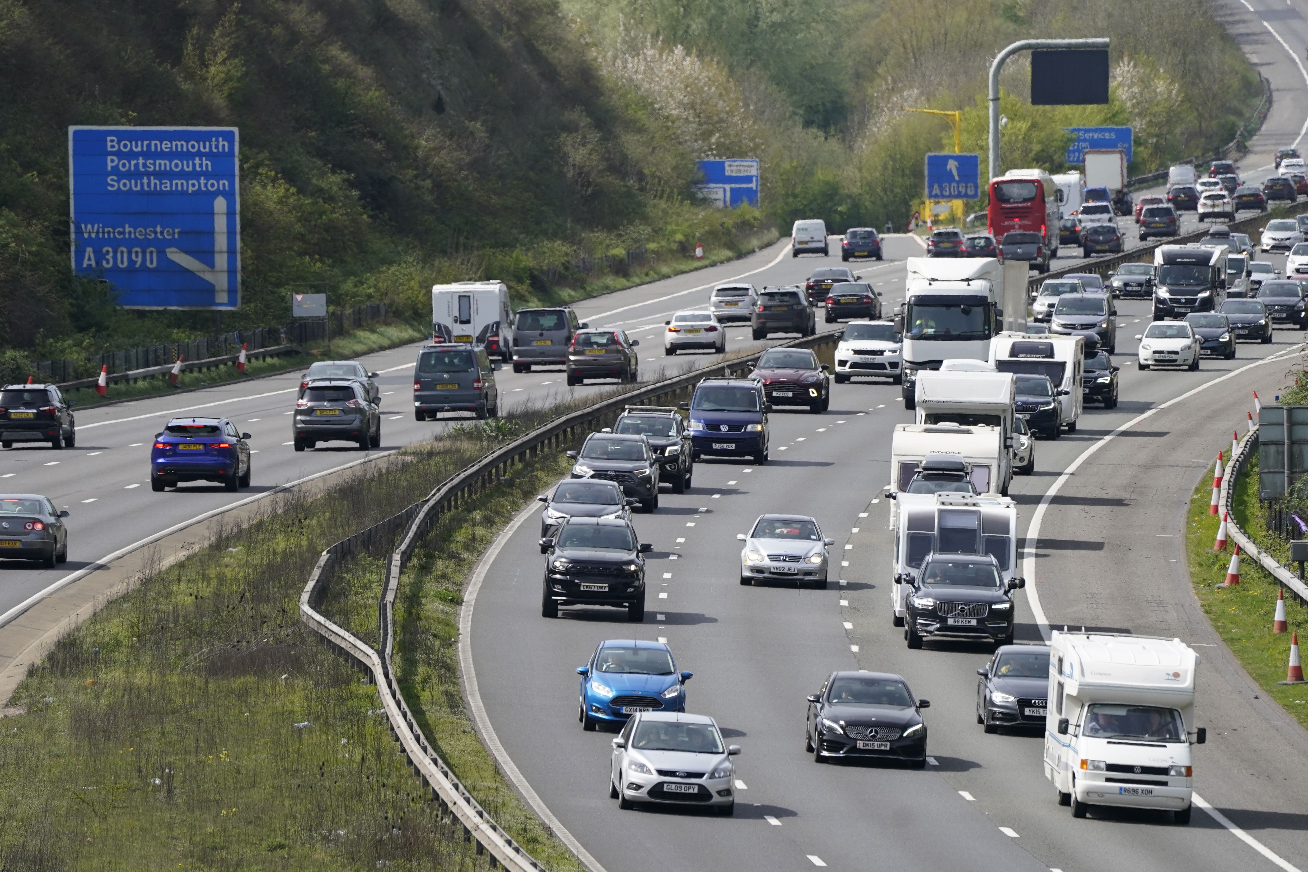 Drivers are being warned it will be illegal to pick up their mobiles during the first test of the Government’s new emergency alert service (Andrew Matthews/PA)