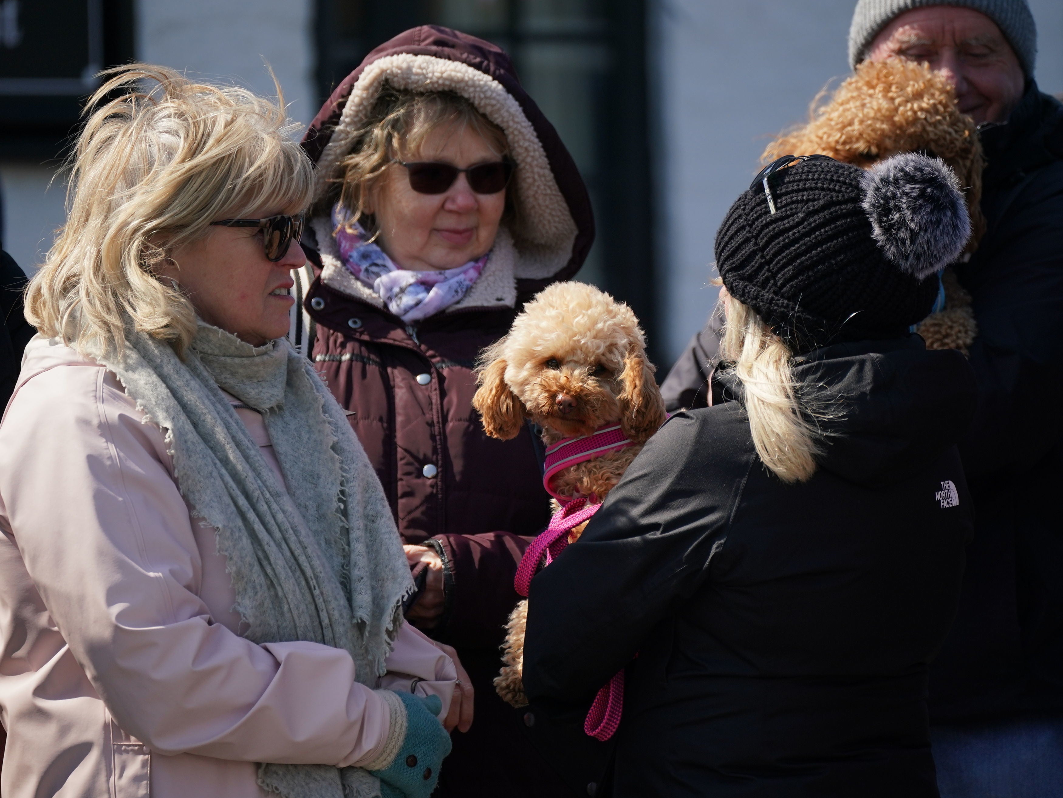 Wellwishers at the Walnut Tree Pub in Aldington, Kent, as they wait for Paul O'Grady's funeral cortege