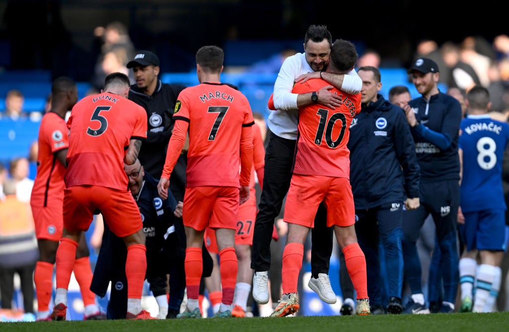 Roberto de Zerbi embraces Alexis Mac Allister following Brighton’s win at Chelsea