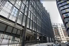 Man dies after becoming ‘trapped under machinery’ in office building