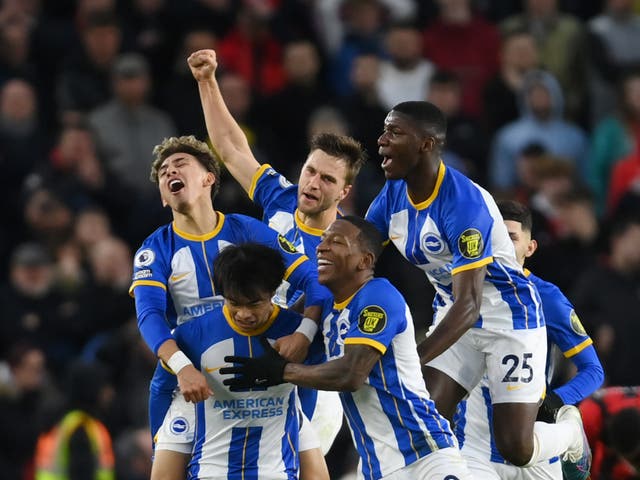 <p>Kaoru Mitoma of Brighton & Hove Albion celebrates with team mates</p>