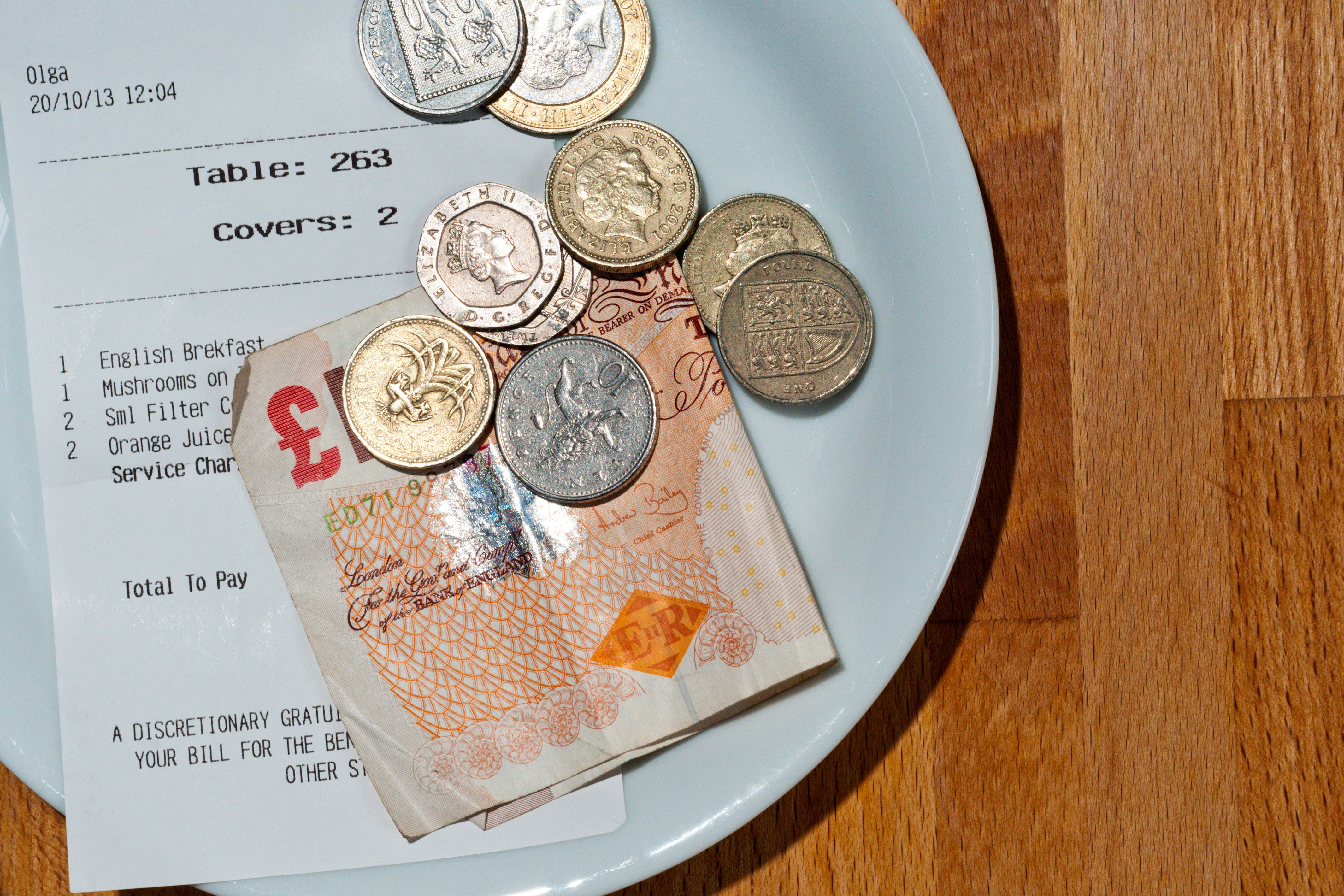 A new Bill introduced makes it a legal obligation on employers to ensure all tips, gratuities and service charges are paid to workers in full (Alamy/PA)