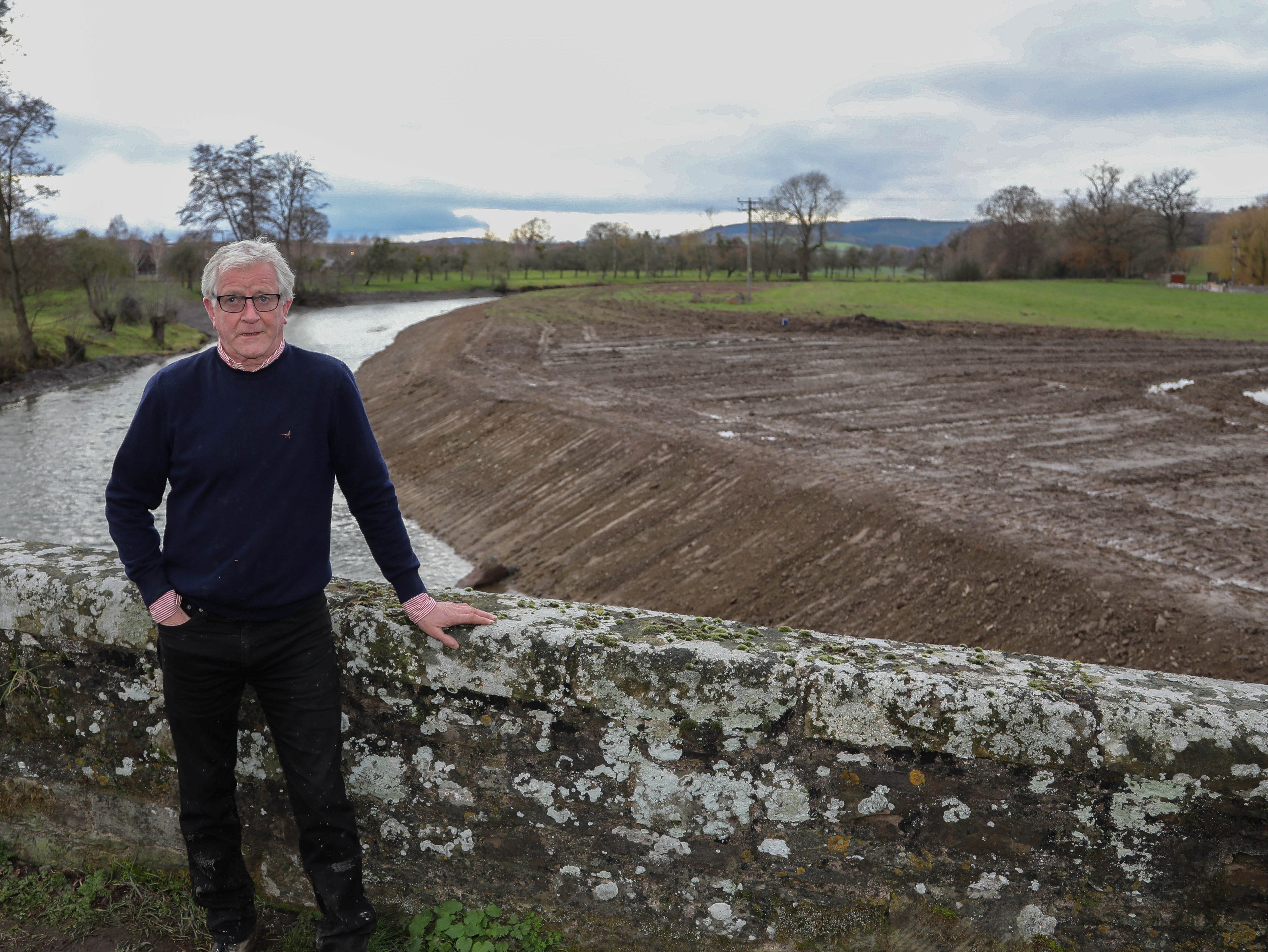 John Price on the bankside of the River Lugg