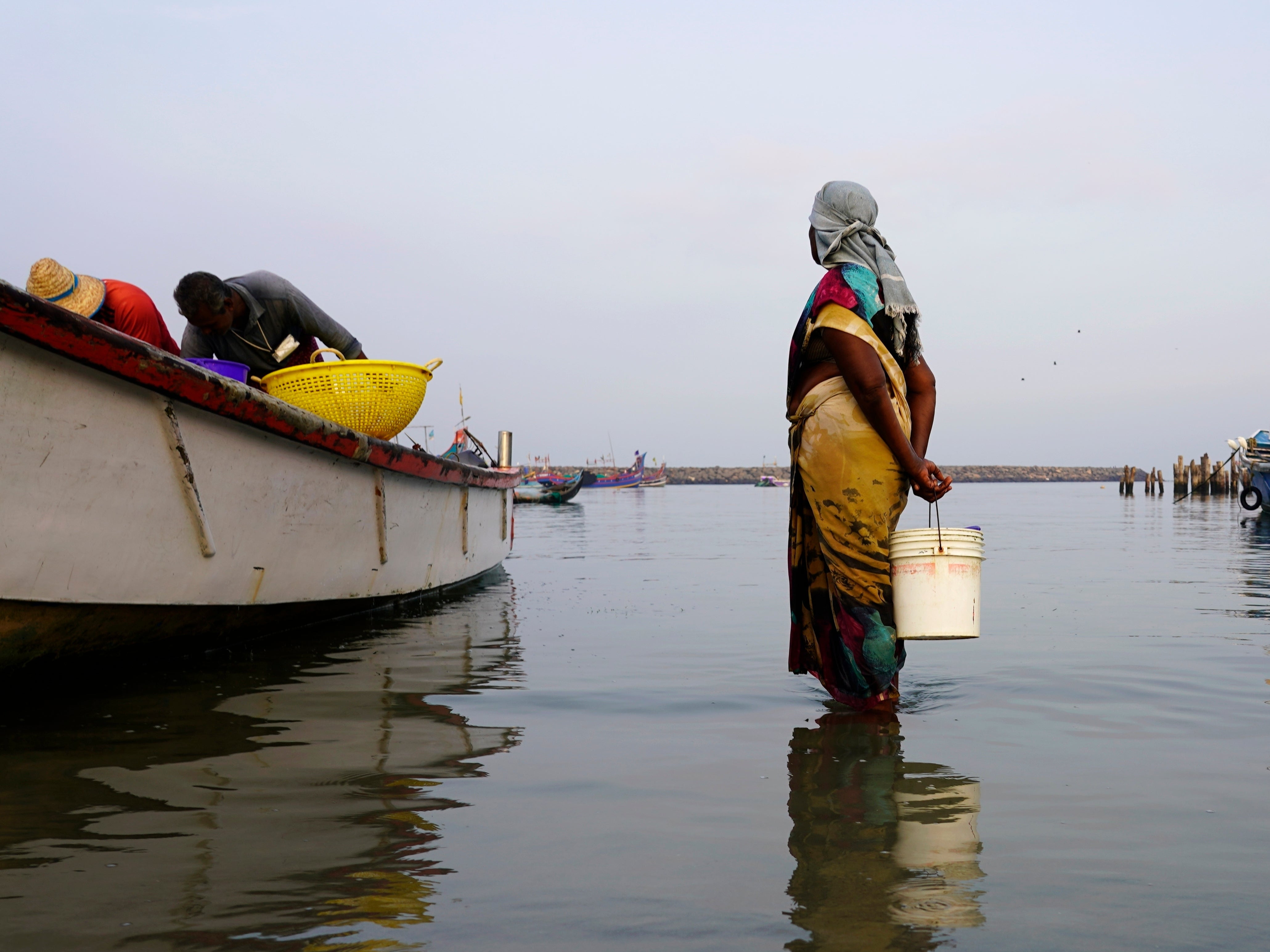 Many in the fishing hamlet of Kochi, Kerala state, India, are living with fears of weather events exacerbated by climate change