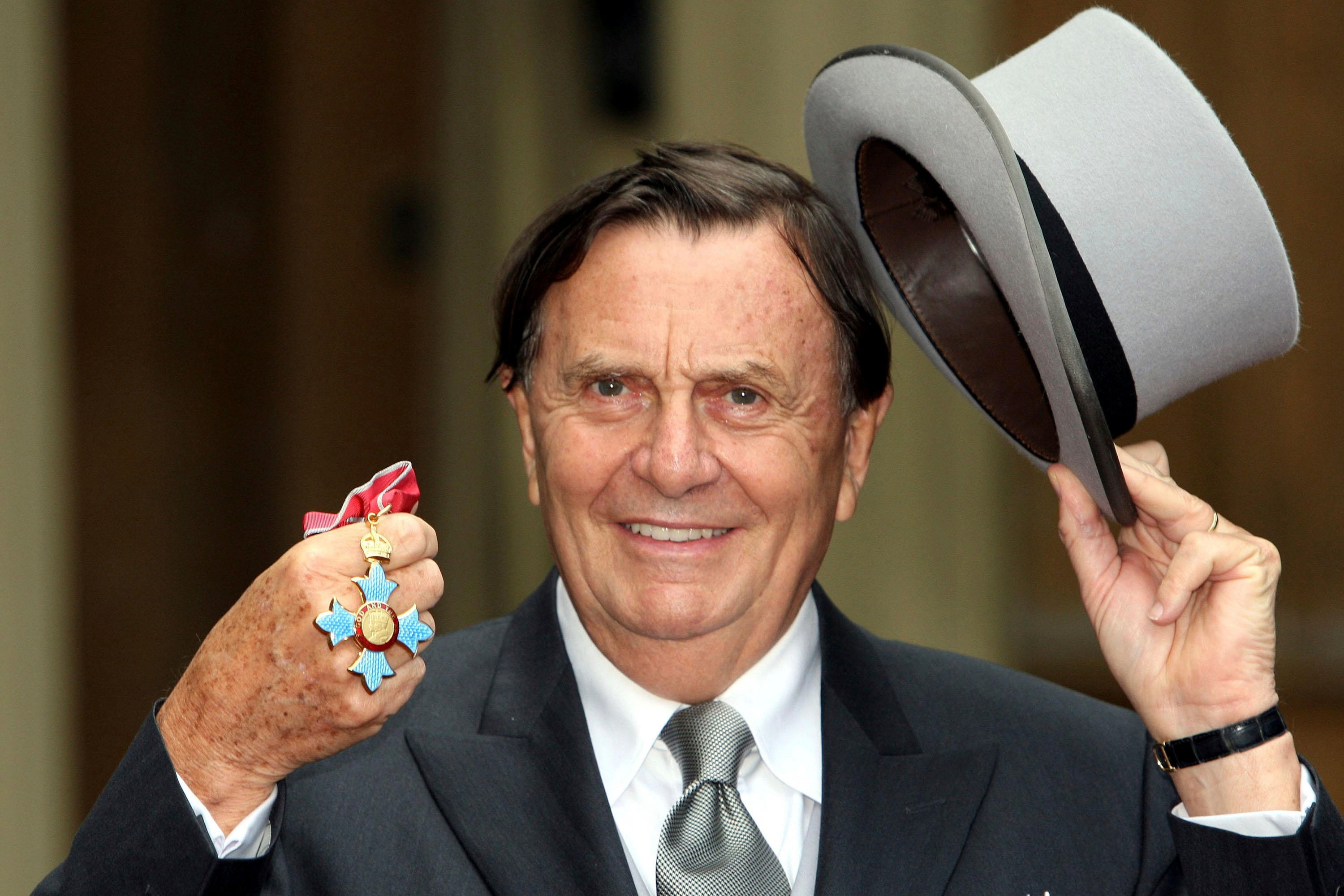 Humphries after he received his Most Excellent Order of the British Empire from Queen Elizabeth II at Buckingham Palace in 2007