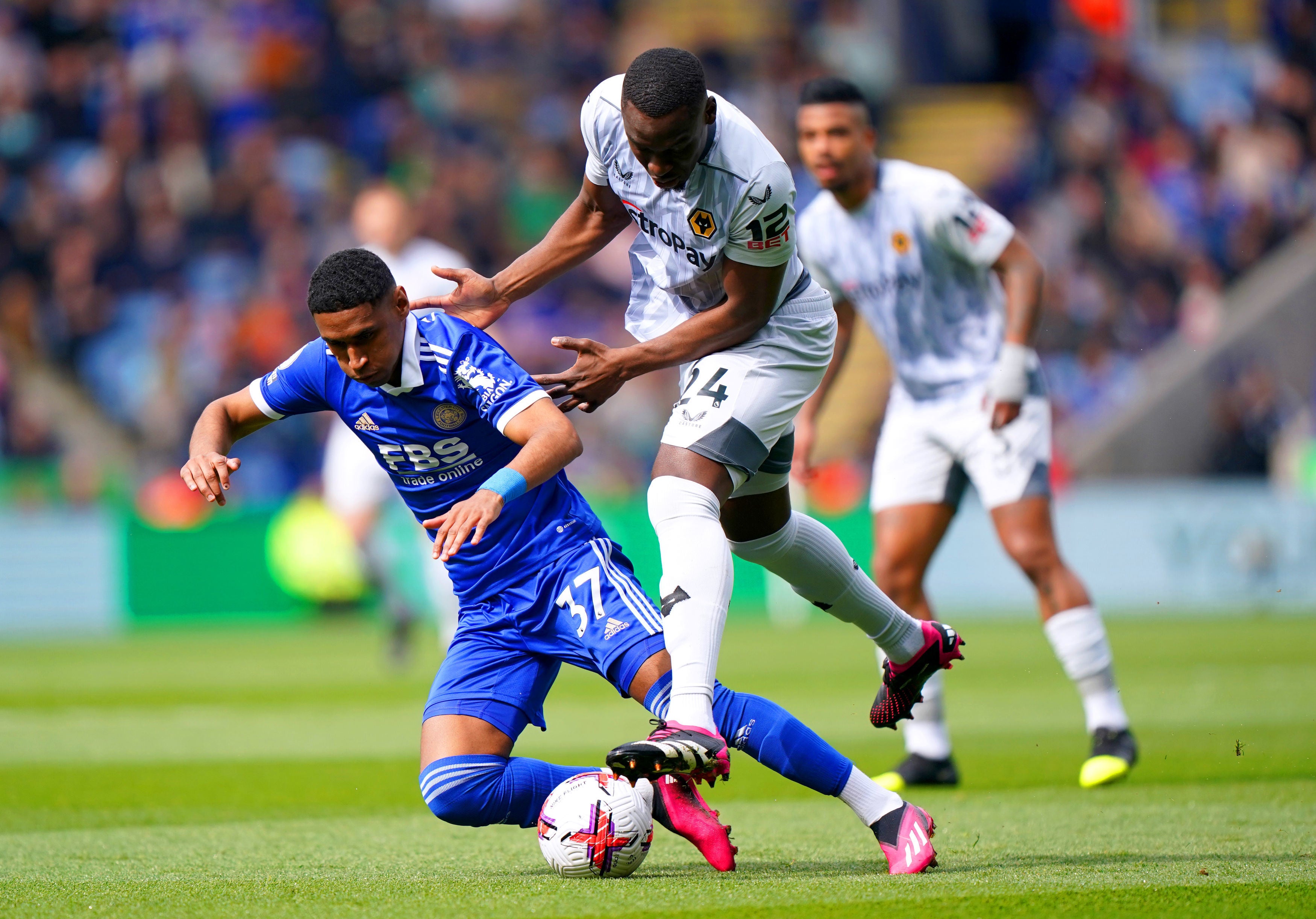 Leicester City's Tete (left) and Wolverhampton Wanderers' Toti battle for the ball