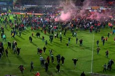 Wrexham fans flood the pitch after historic 3-1 win over Boreham Wood