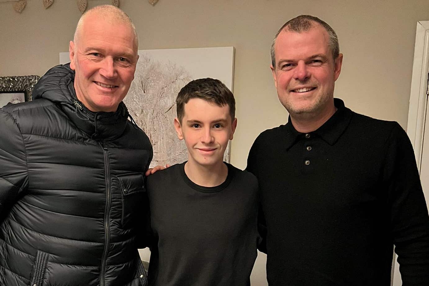 Ayr United manager Lee Bullen (left), and managing director Graeme Mathie (right), with Connor Elliot