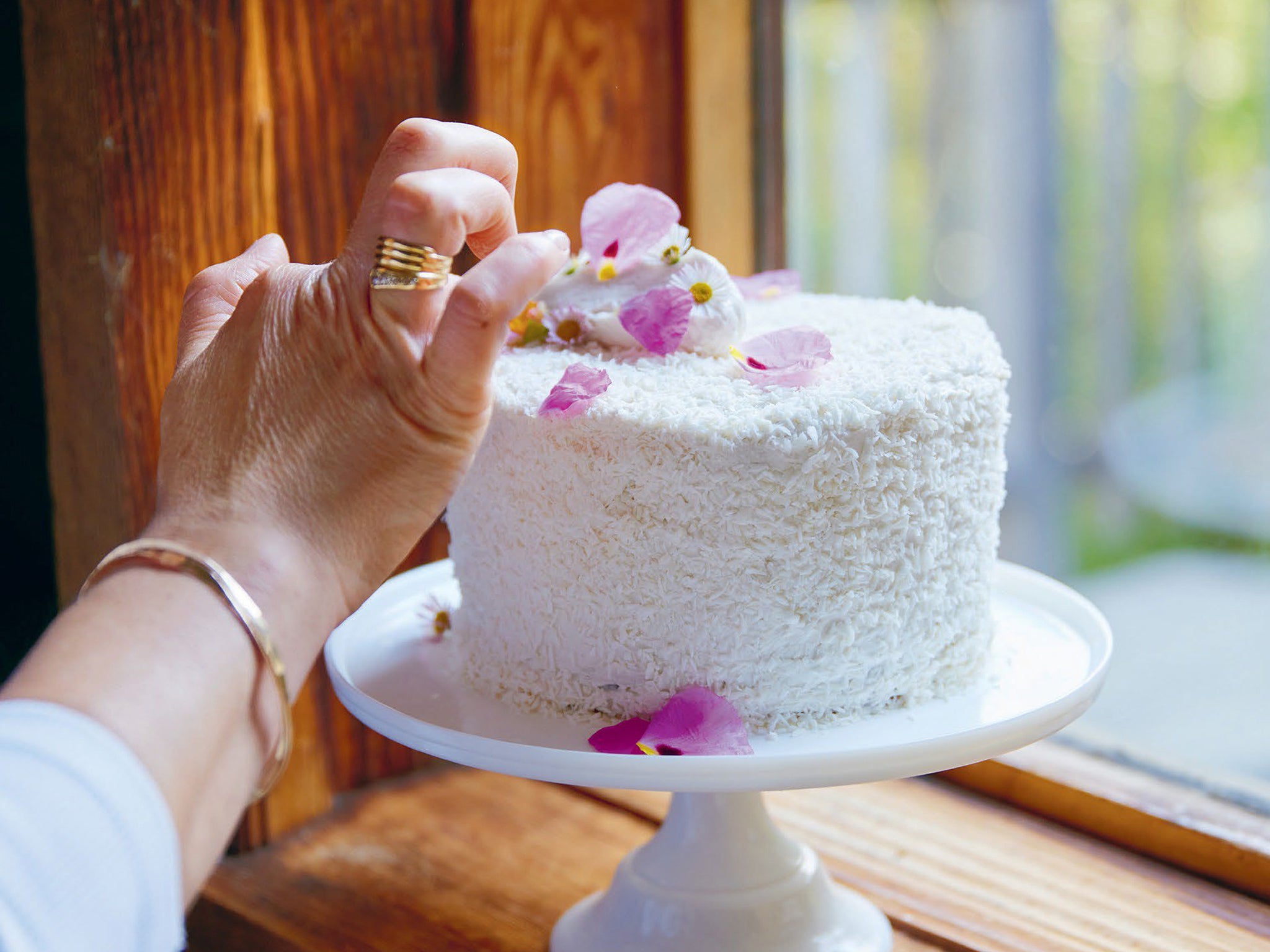 The filling is based on a classic Hawaiian pudding recipe called Haupia, which is often used in wedding cakes