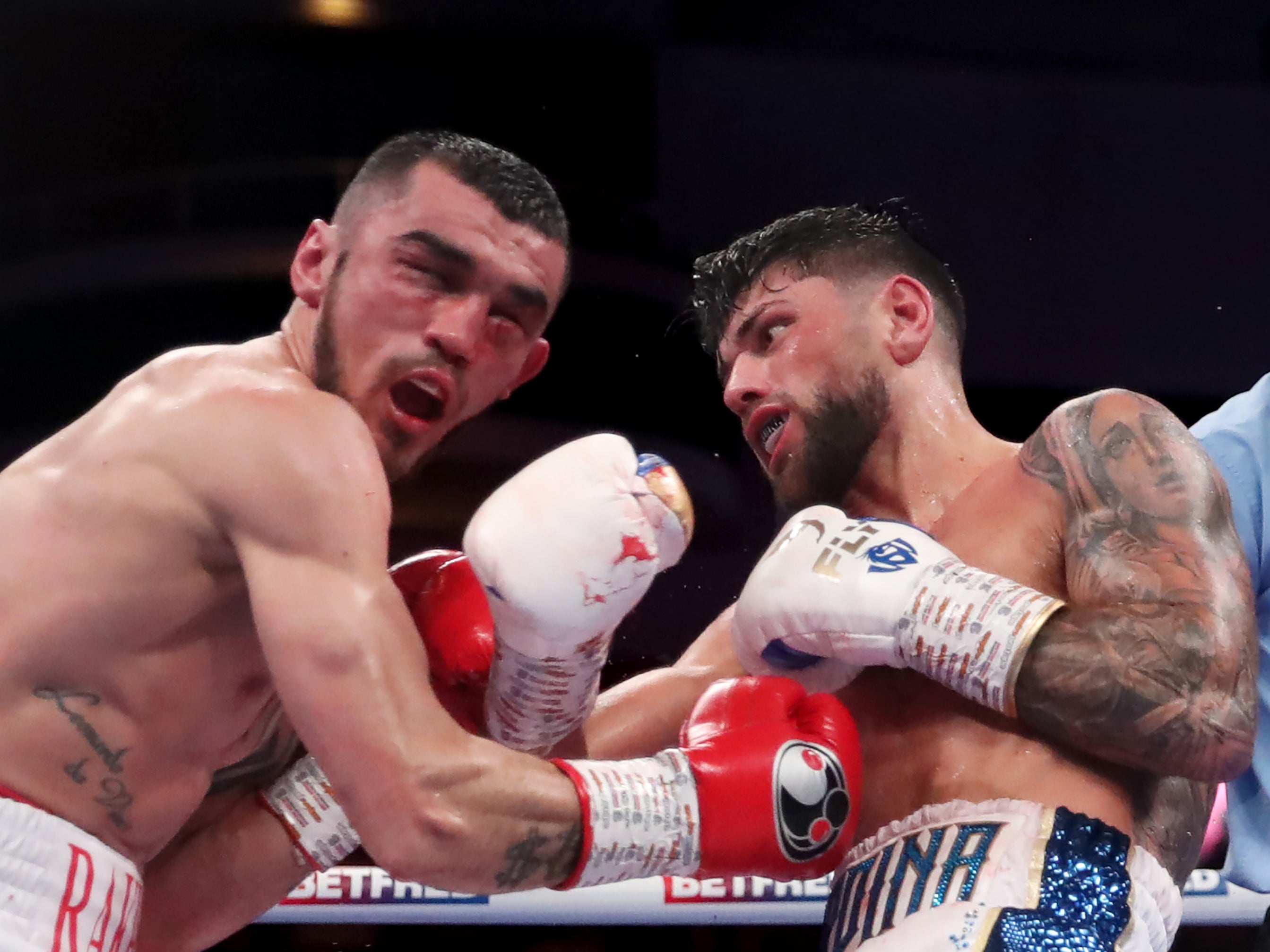 Joe Cordina (right) dropped Shavkat Rakhimov en route to a decision win