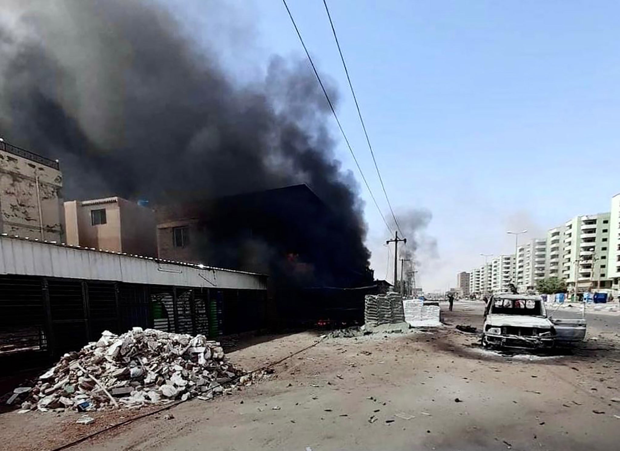 A battle-damaged street in Khartoum