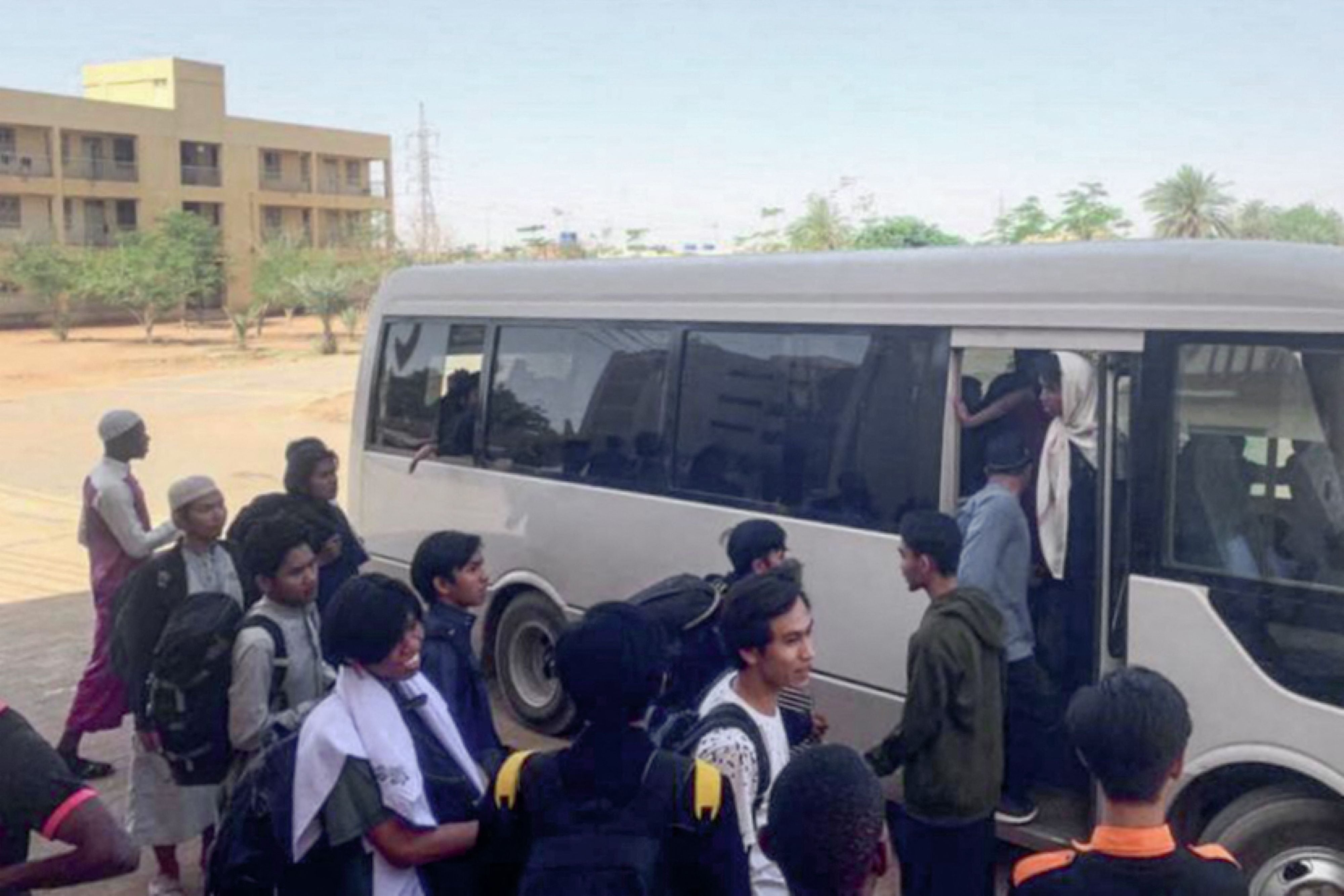 ndonesian nationals being evacuated by bus from Khartoum to Port Sudan