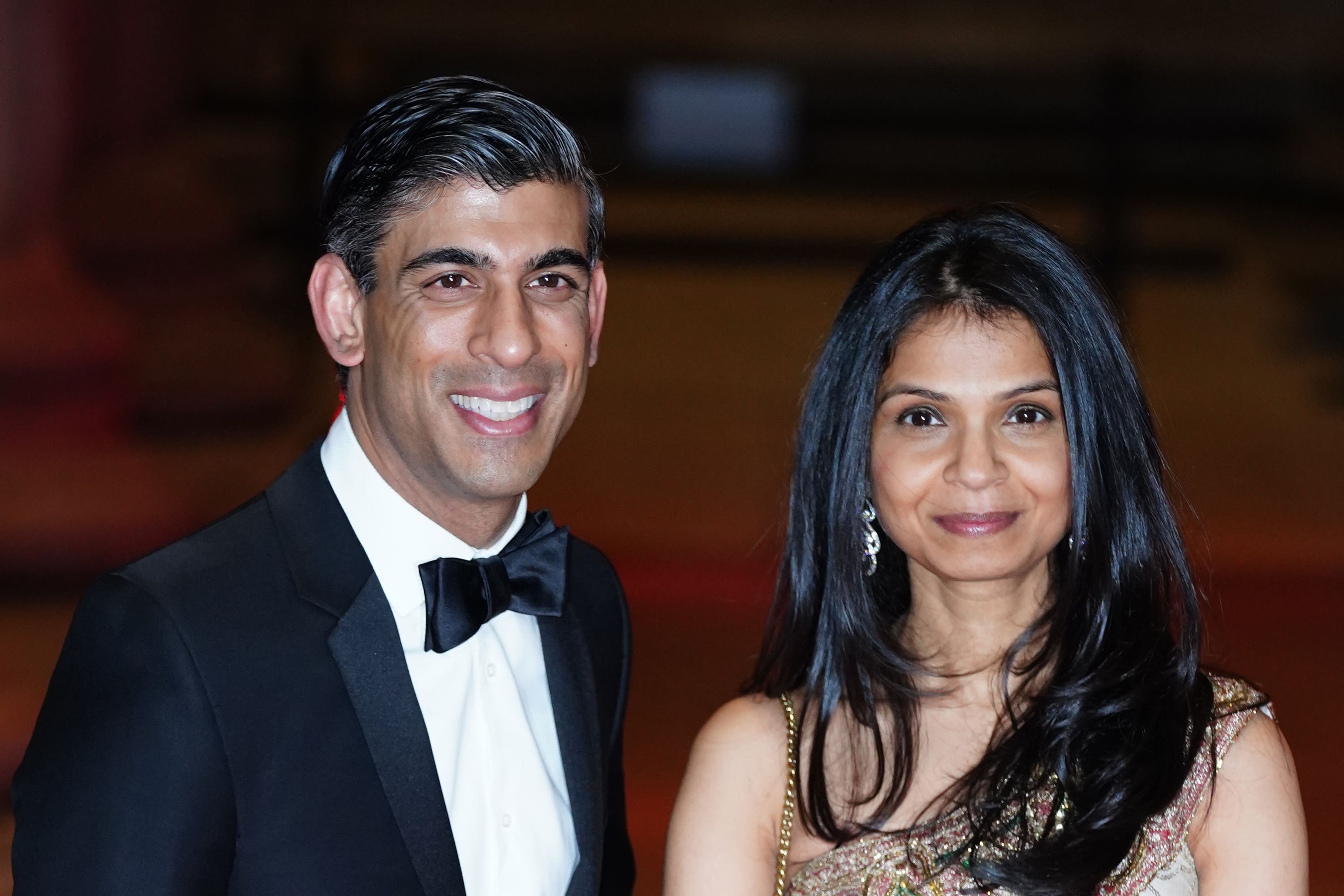 Rishi Sunak and his wife Akshata Murty (Ian West/PA)