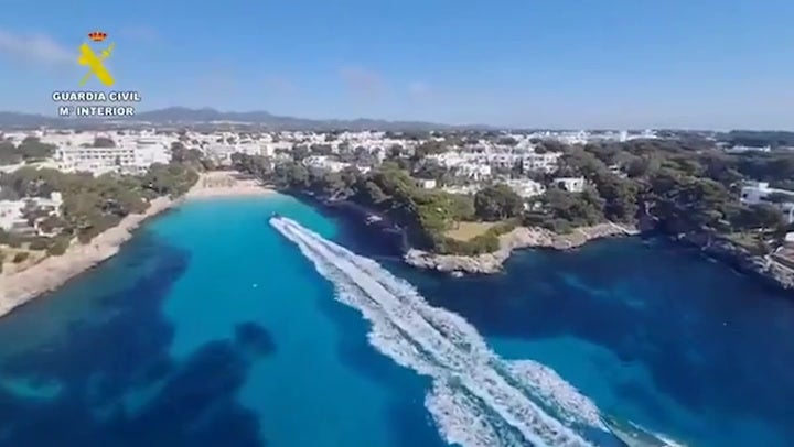 Watch: Speedboat-driving drugs traffickers flee police before chase through holiday resort