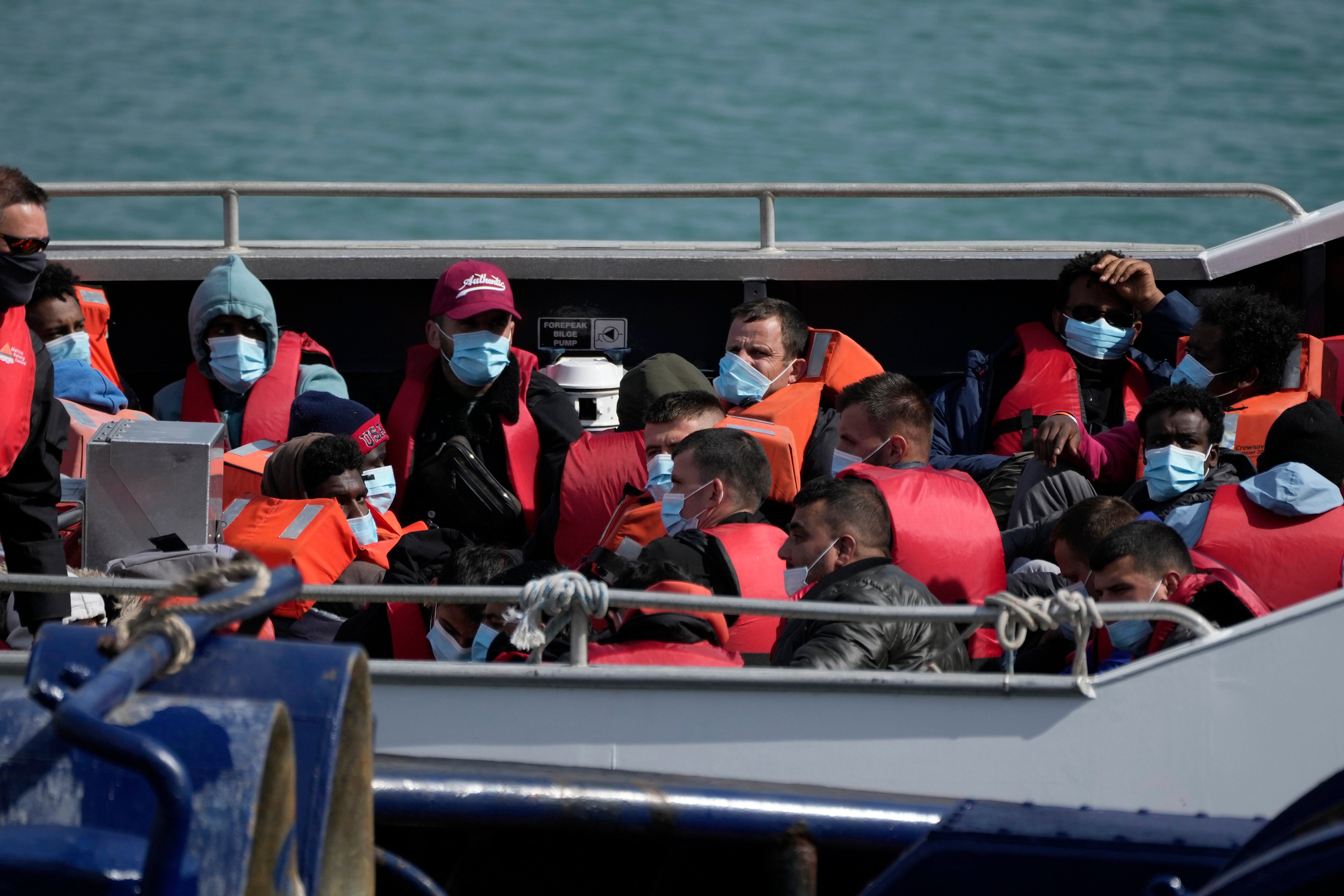 The government amendment would legalise a previously unlawful policy of seizing all small boat migrants’ phones