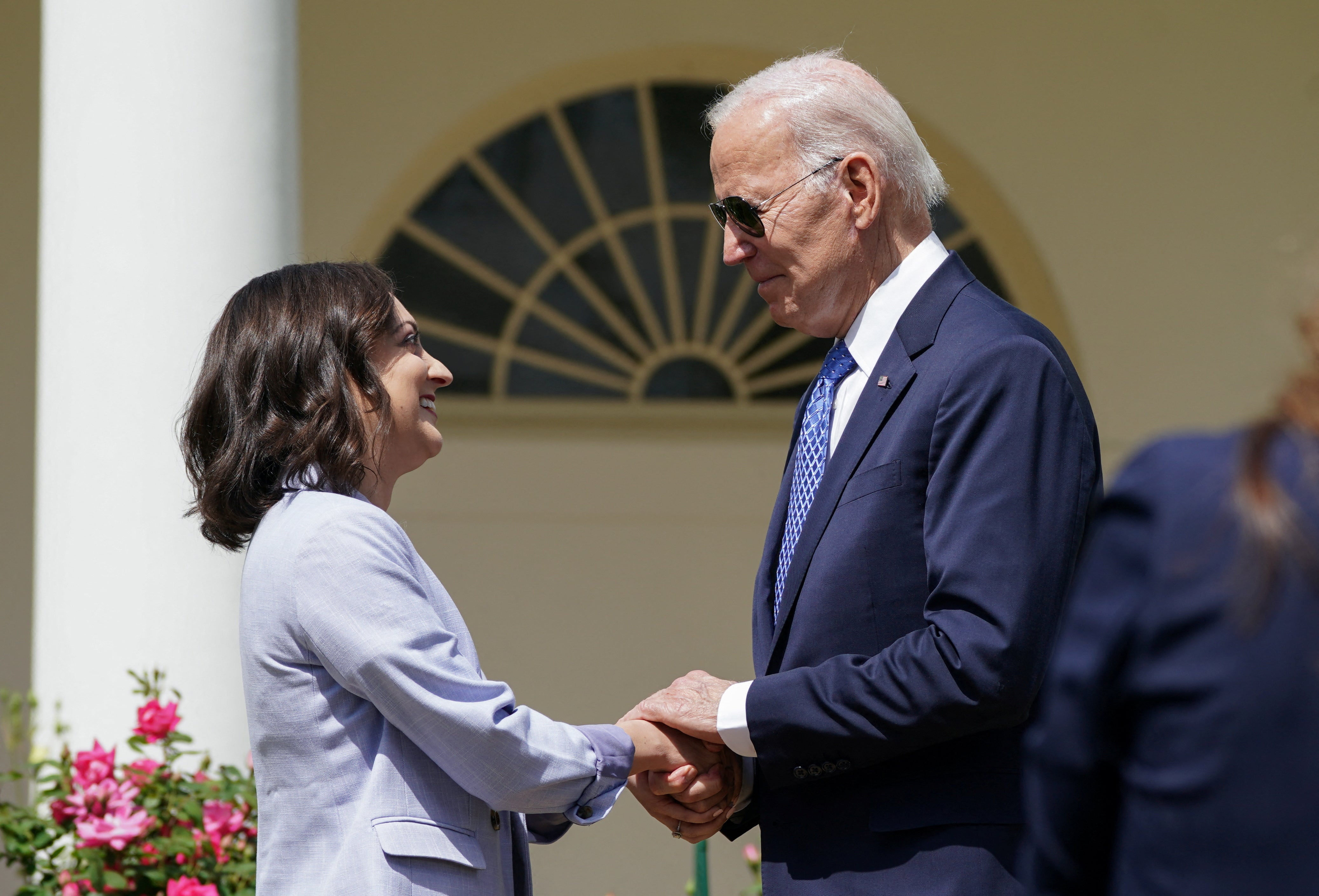 President Joe Biden speaks to 2023 Teacher of the Year Rebecka Peterson from Oklahoma on 23 April.