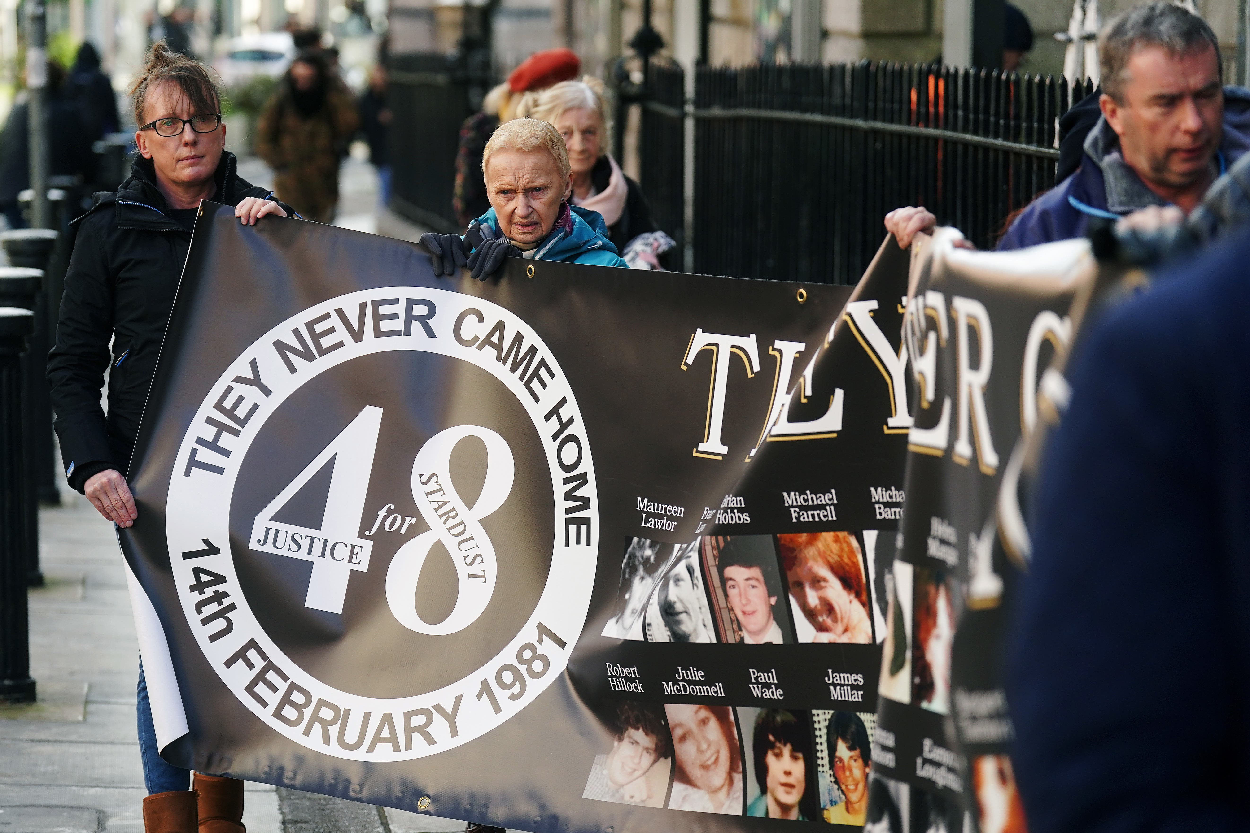 Family members of victims of the Stardust tragedy along with supporters arriving at the Rotunda Foundation in Dublin for the 15th pre-inquest hearing into the Stardust fire (Brian Lawless/PA)