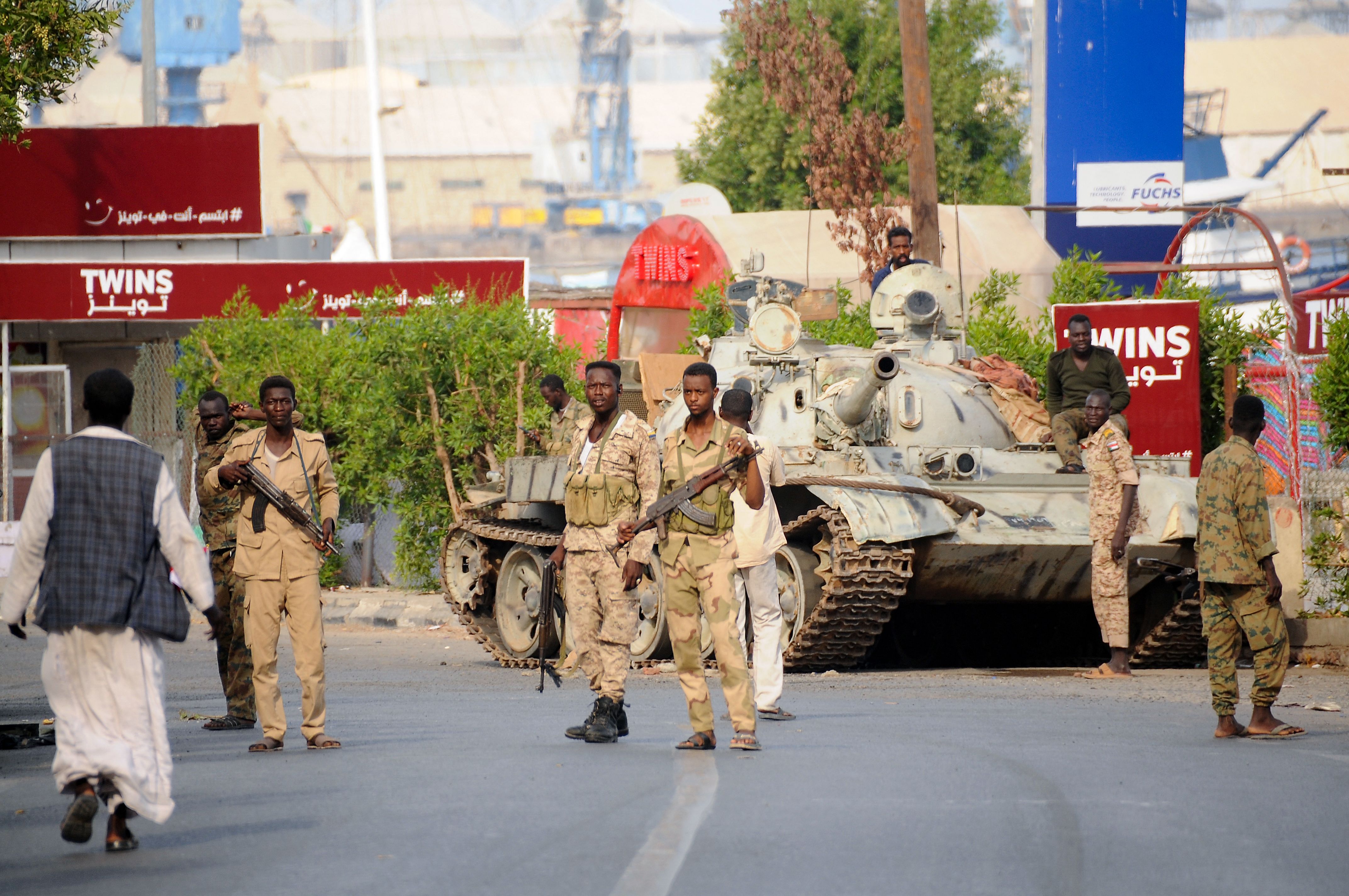 Sudanese army soldiers, loyal to Abdel Fattah al-Burhan, man a position in the Red Sea city of Port Sudan