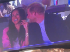 Harry makes Meghan giggle as couple appear on jumbotron at Lakers game