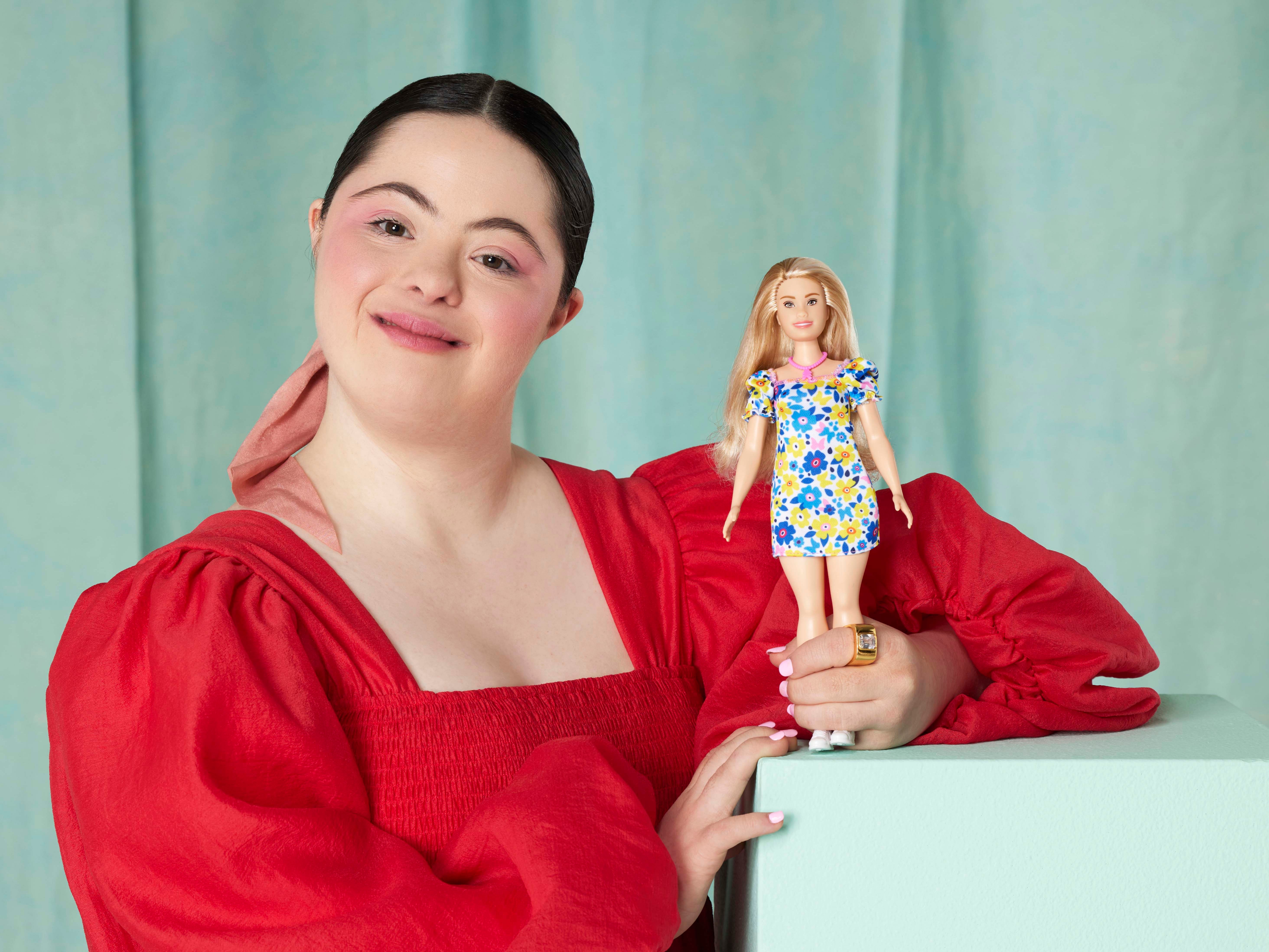 Model Ellie Goldstein poses with Barbie’s first doll with Down’s syndrome