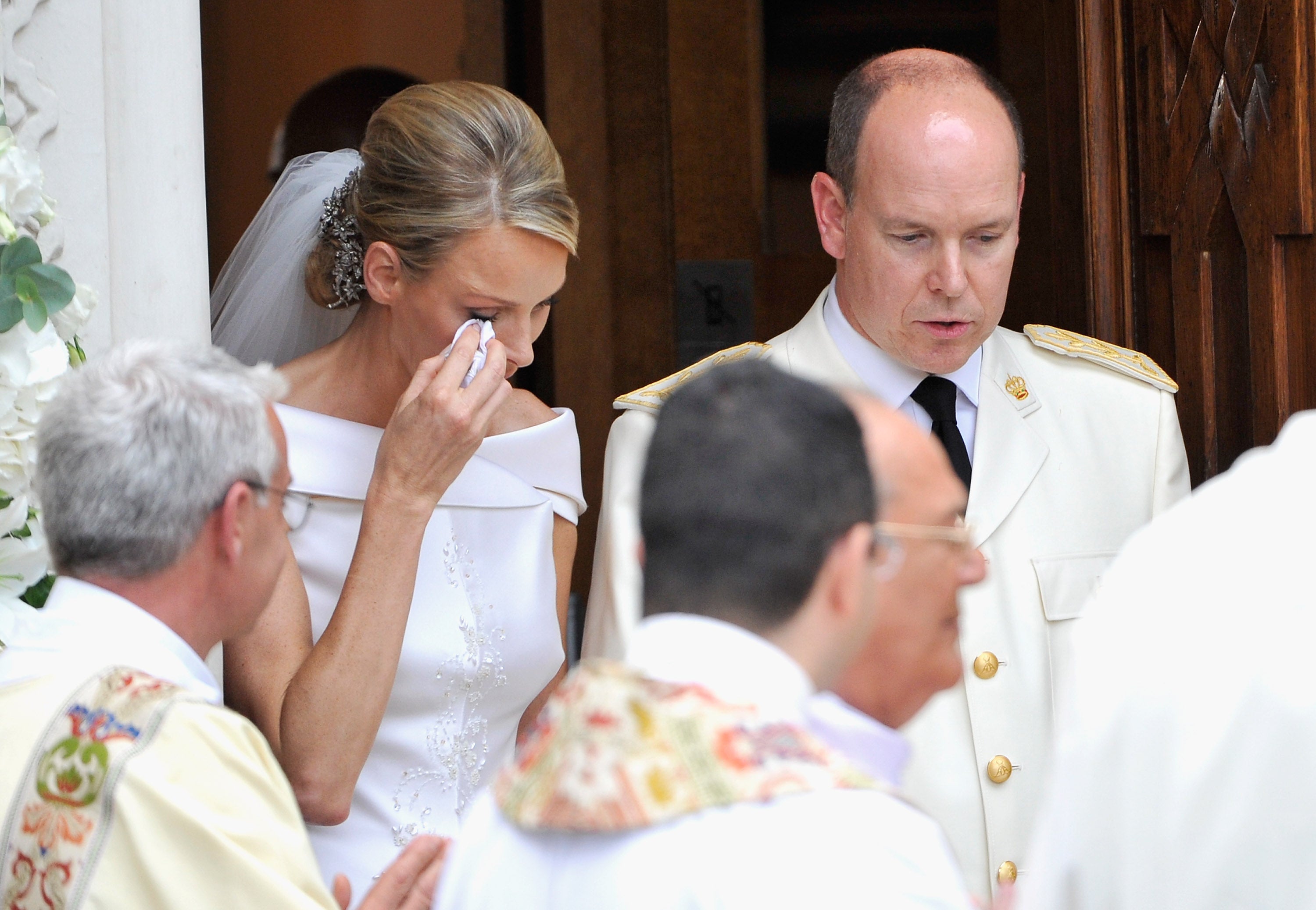 Princess Charlene wipes away a tear on wedding day to Prince Albert II of Monaco