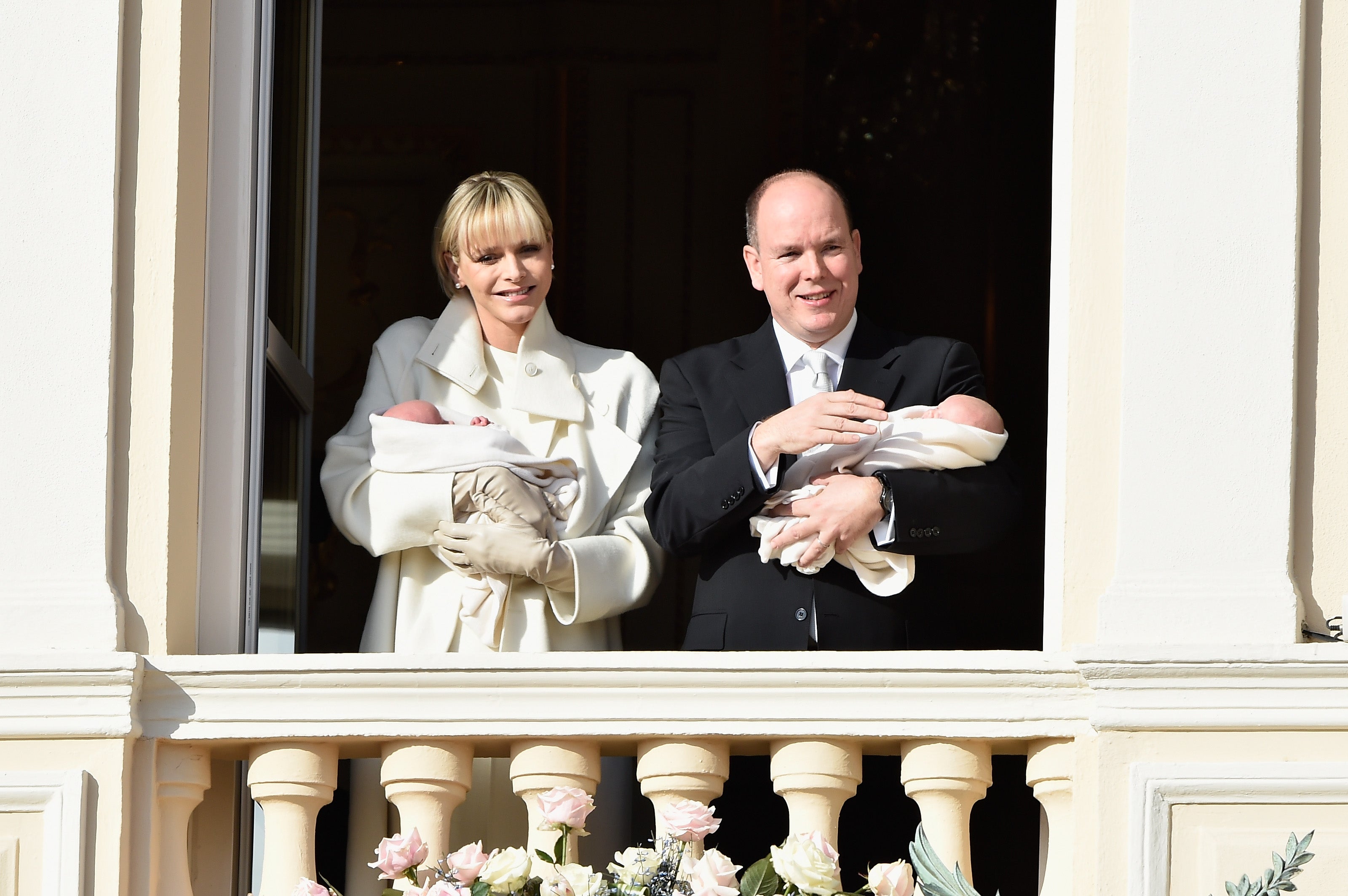 Prince Albert II and Princess Charlene pose with their twins on the Balcony of the Monaco Palace in January 2015