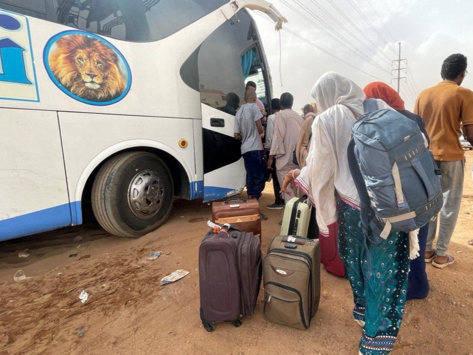 People flee clashes between the paramilitary Rapid Support Forces and the army in Khartoum