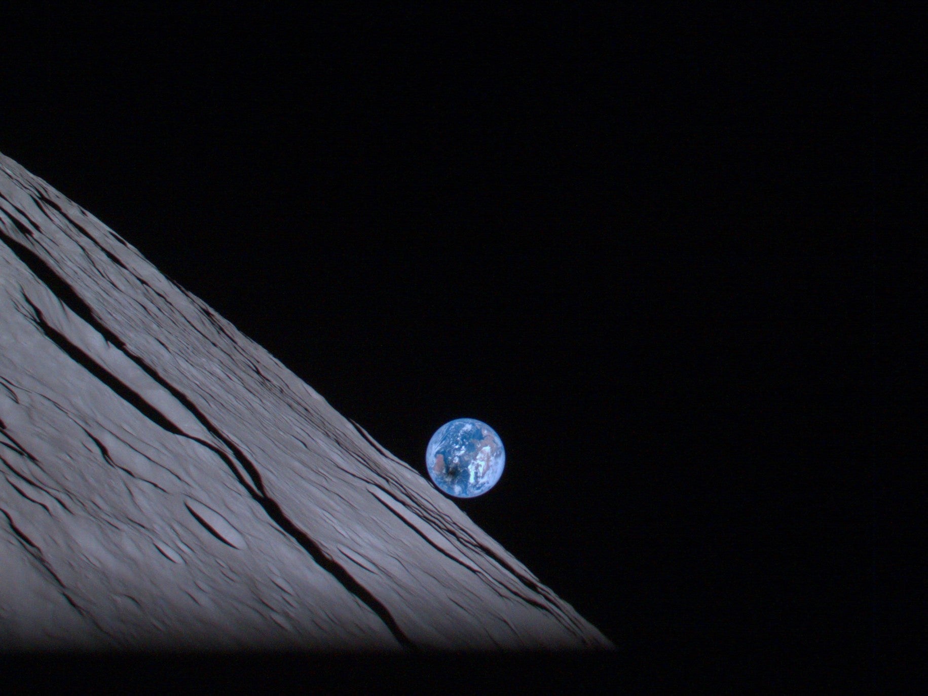 The lunar Earthrise during solar eclipse, captured by the camera of ispace’s Mission 1 lander at an altitude of about 100 km from the lunar surface