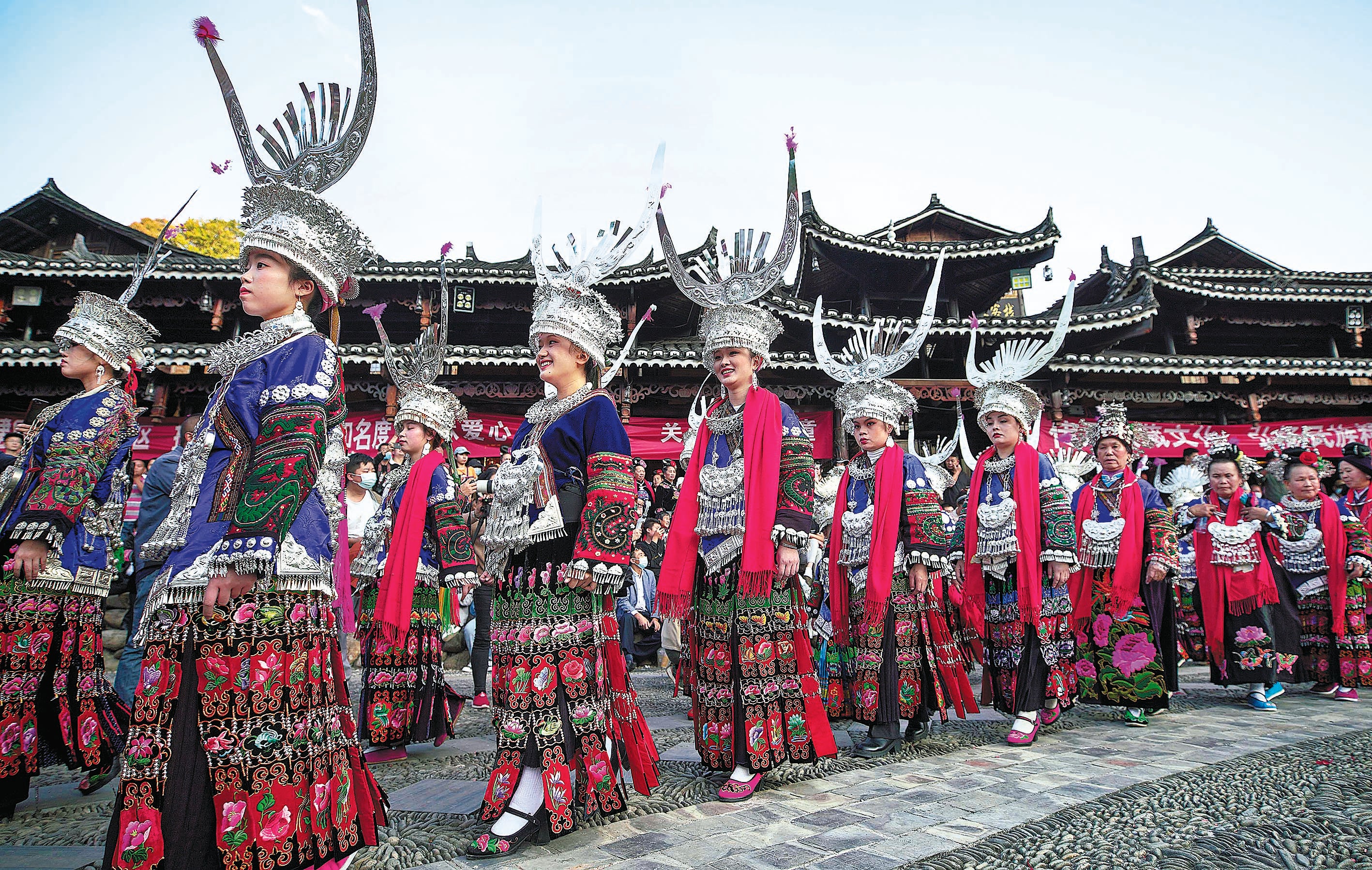 Residents of Xijiang Qianhu Miao village attend a dance festival in November 2022