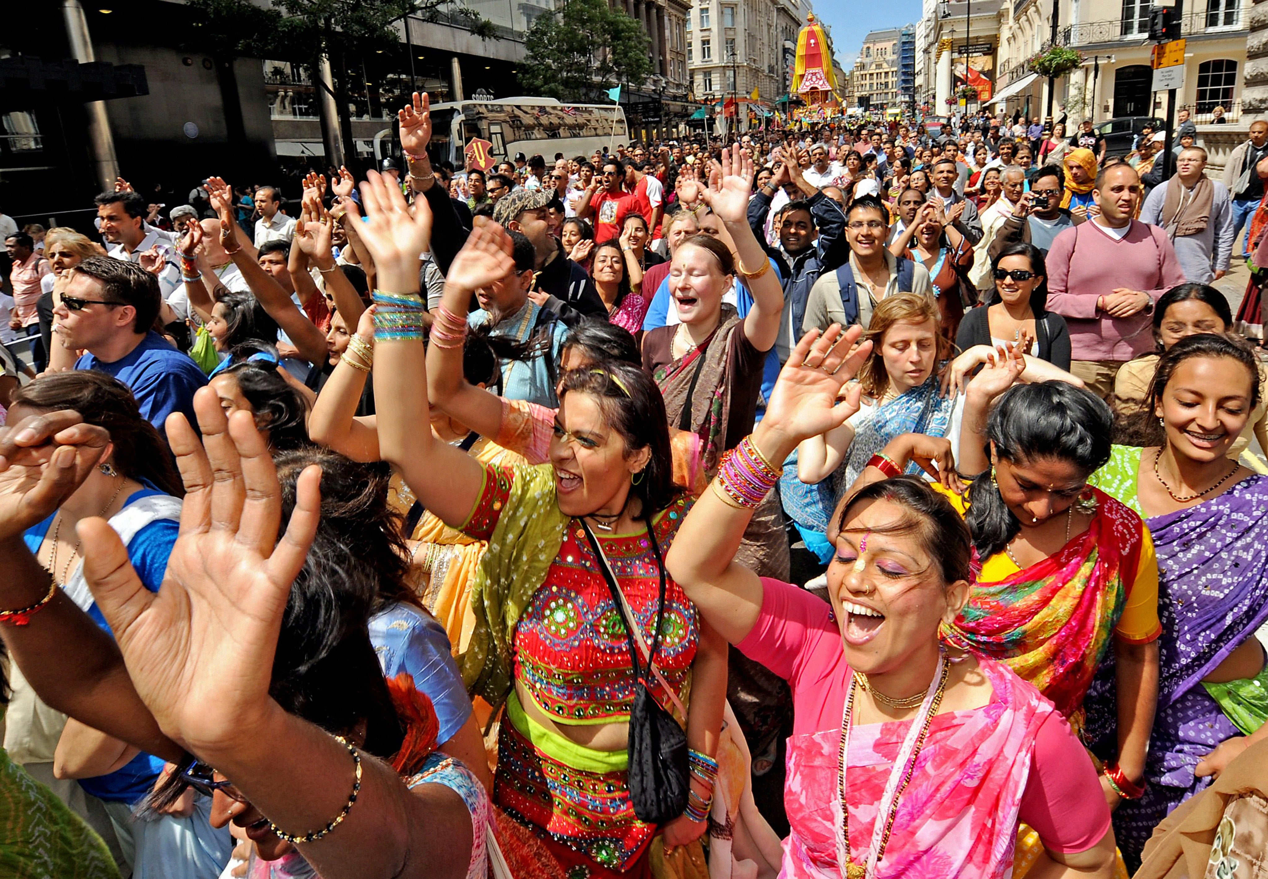 Worshippers take part in the 40th Rathayatra festival in central London where three 40-foot high brightly coloured wooden chariots are pulled by hand from Hyde Park to Trafalgar Square