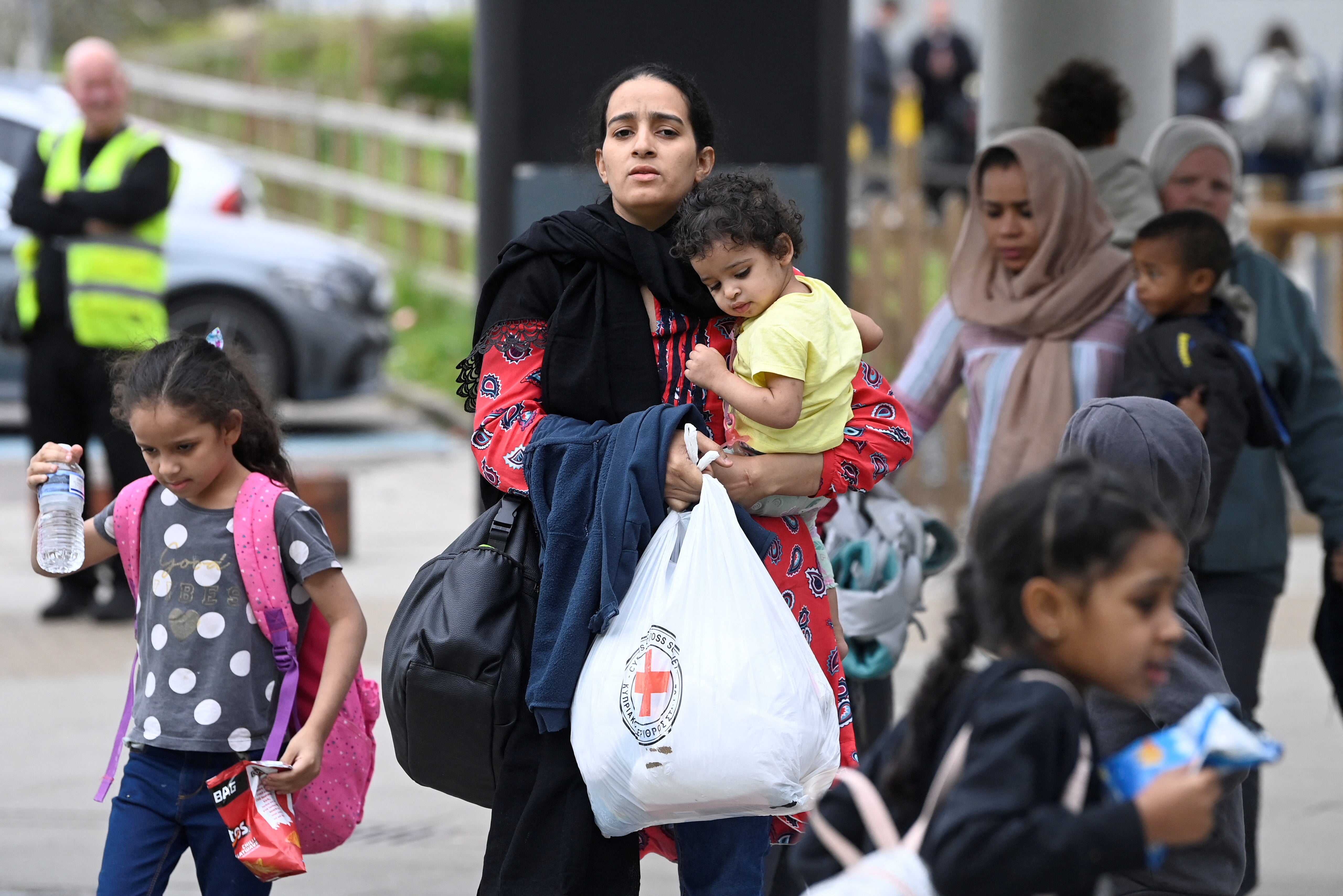 Evacuees, believed to be British nationals, arrive at Stansted Airport following evacuation from Sudan