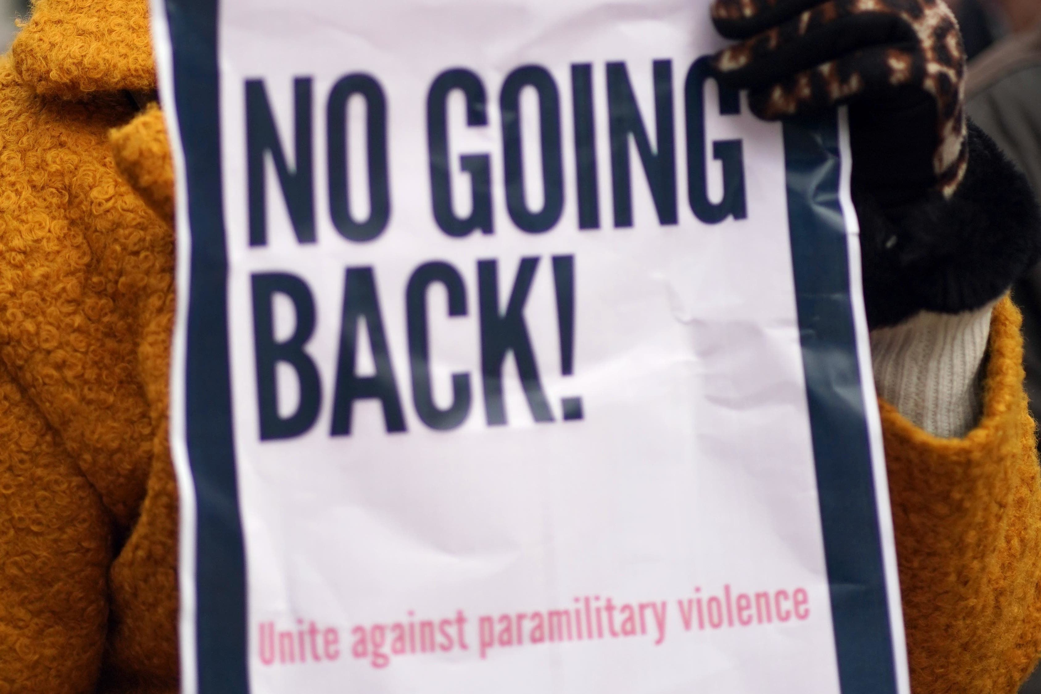 People taking part in a rally to unite against paramilitary violence (Brian Lawless/PA)