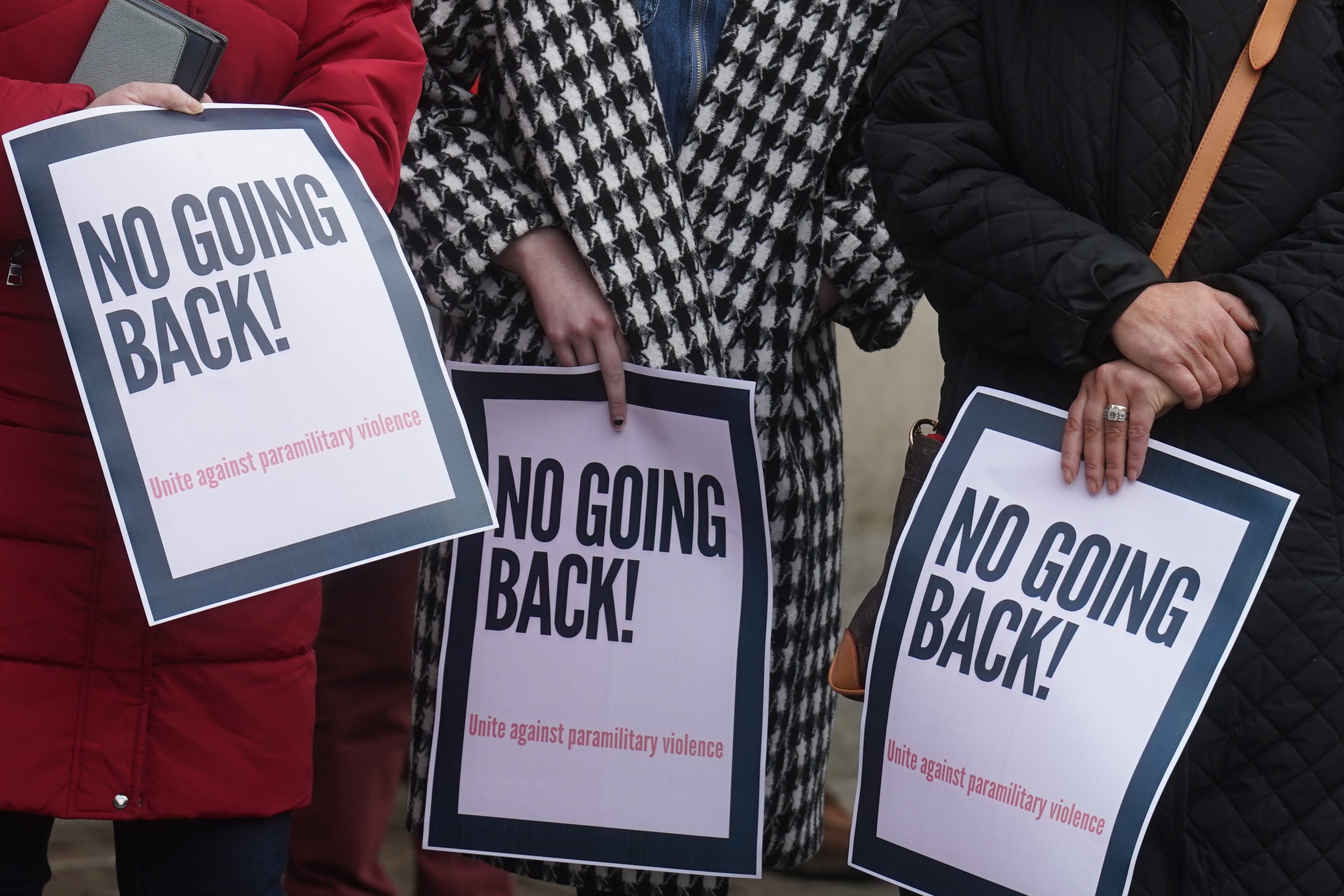 People start to gather to take part in a rally outside Omagh Courthouse to unite against paramilitary violence following the shooting of Detective Chief Inspector John Caldwell. Picture date: Saturday February 25, 2023.