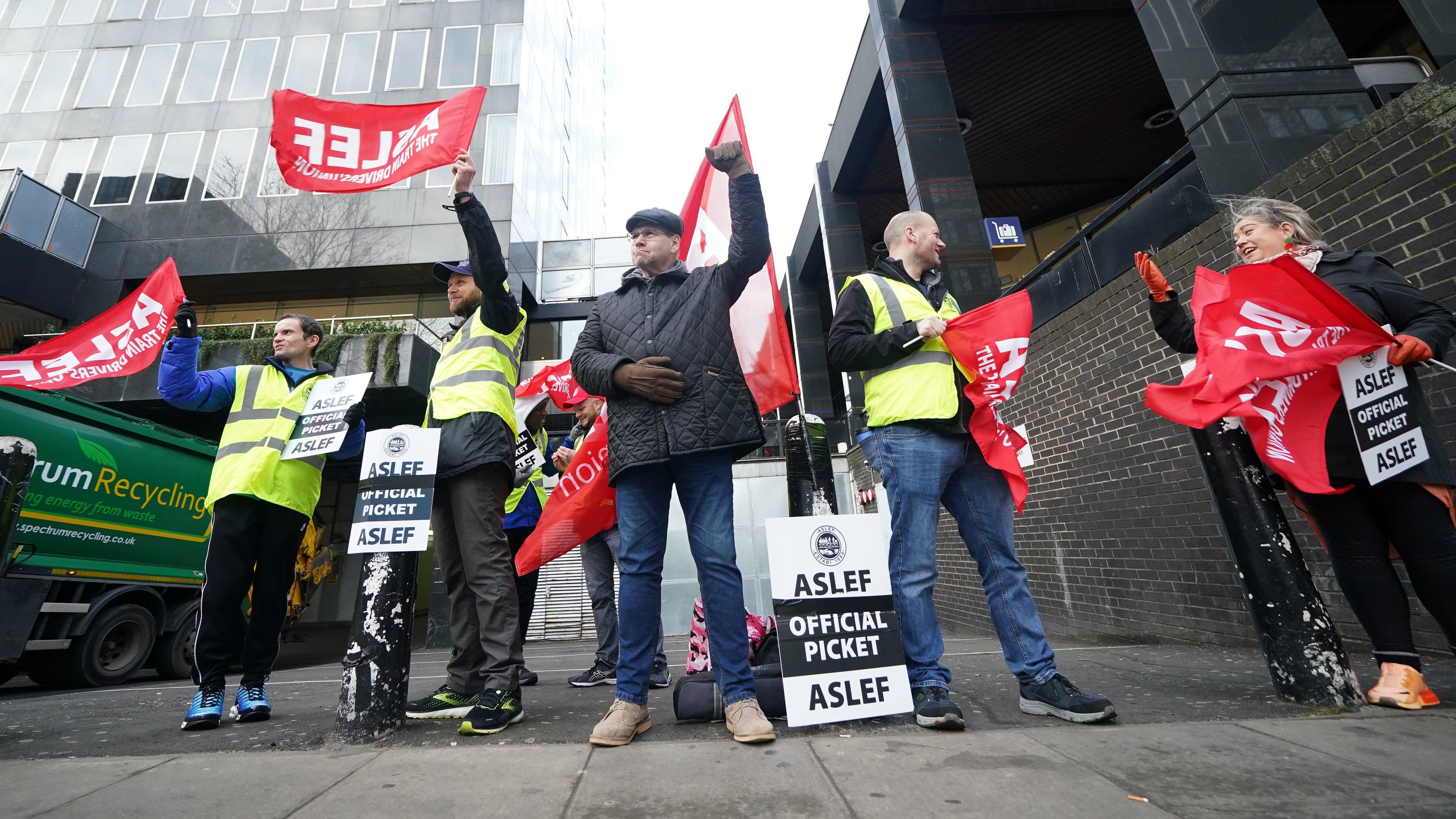 Aslef General Secretary Mick Whelan (centre) joins train workers on the picket line at Euston station