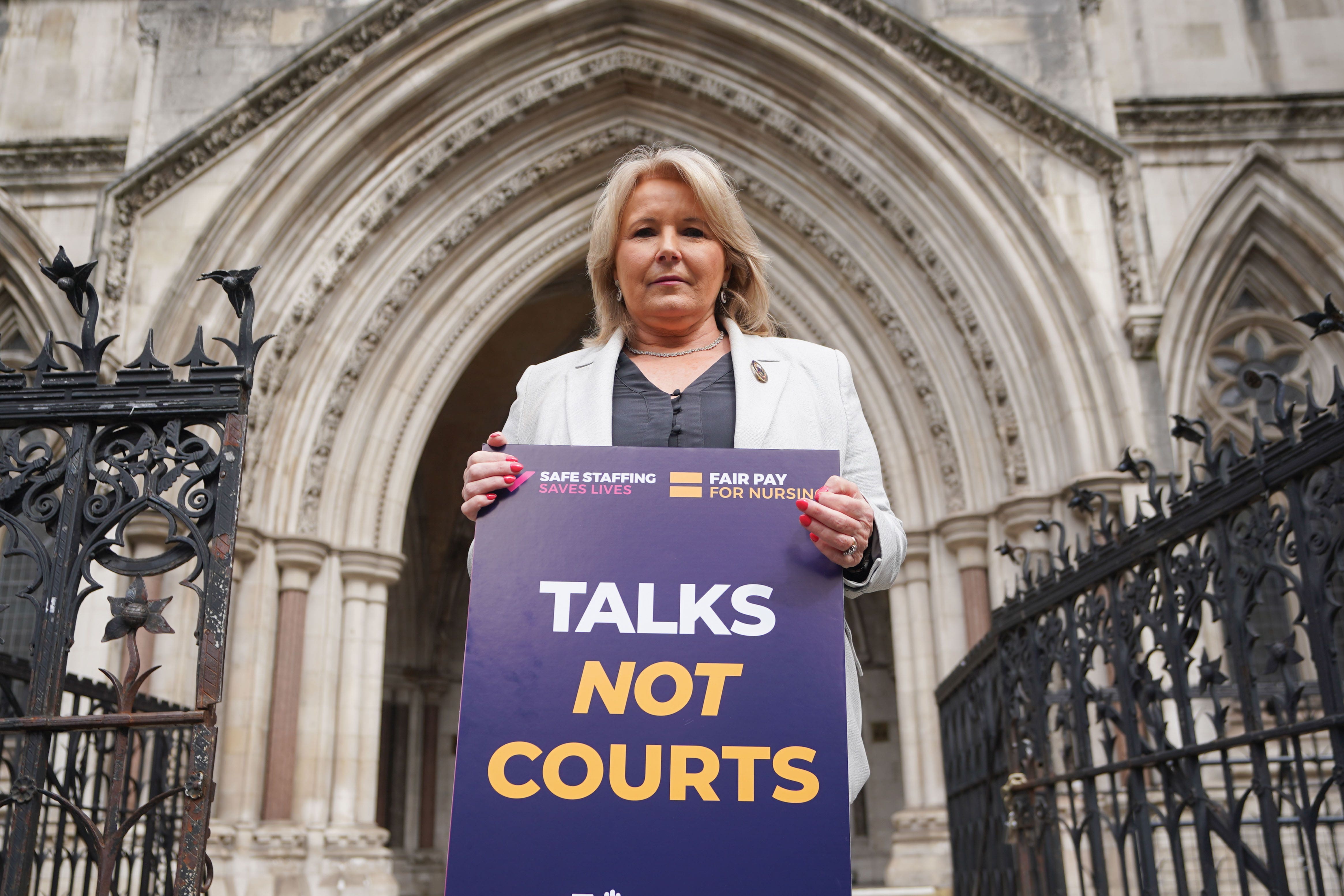 General Secretary of the Royal College of Nursing, Pat Cullen joins nurses outside the High Court in central London, where the Government is bringing a challenge over the planned strike action by the Royal College of Nurses (RCN) in the long-running dispute over pay. Health Secretary Steve Barclay has said he was “regretfully” applying to the High Court to declare the walkout planned for May 2 unlawful. Picture date: Thursday April 27, 2023.