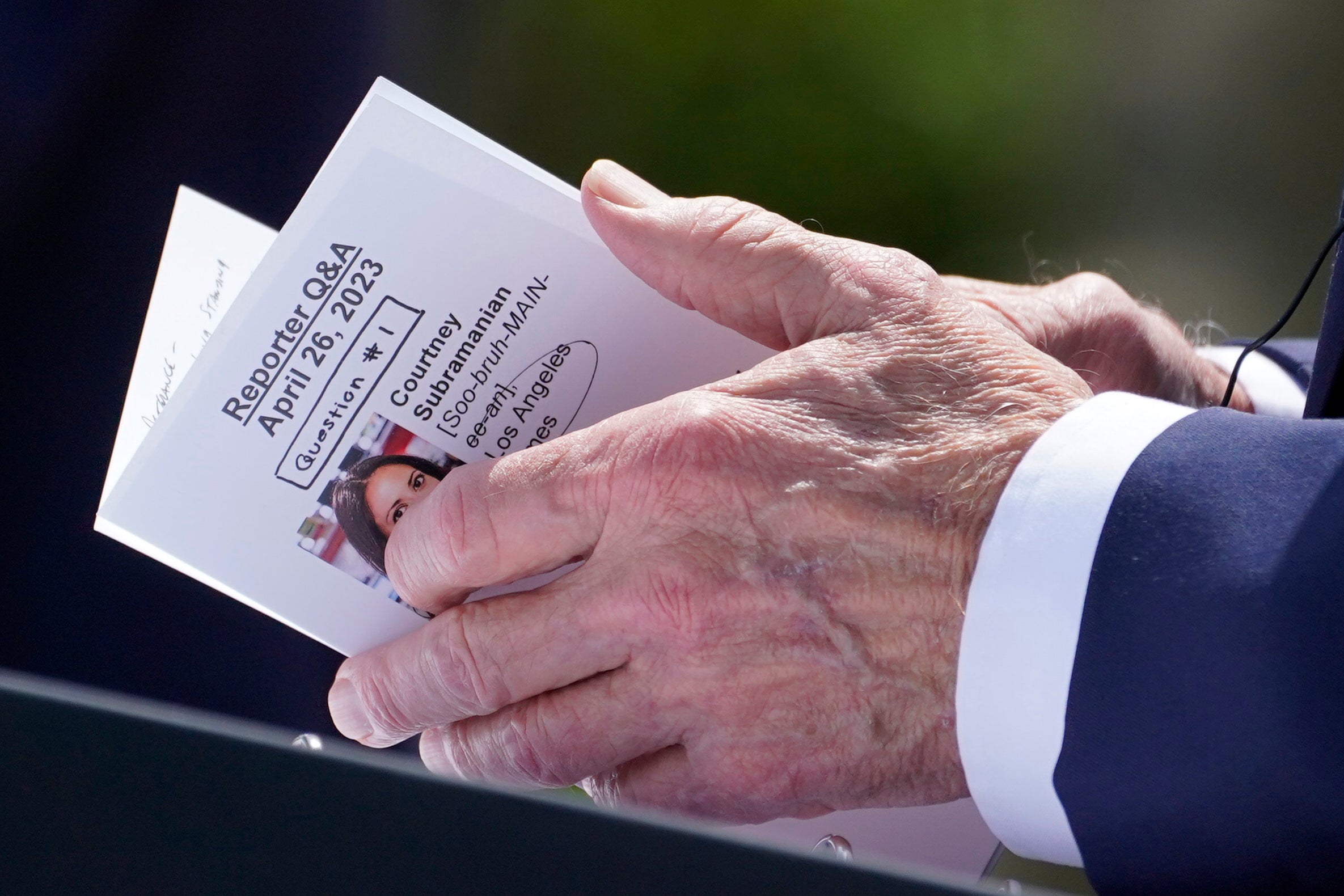 An image of Los Angeles Times correspondent Courtney Subramanian is seen as President Joe Biden looks through notes during a news conference with South Korea's President Yoon Suk Yeol in the Rose Garden of the White House on Wednesday, April 26, 2023