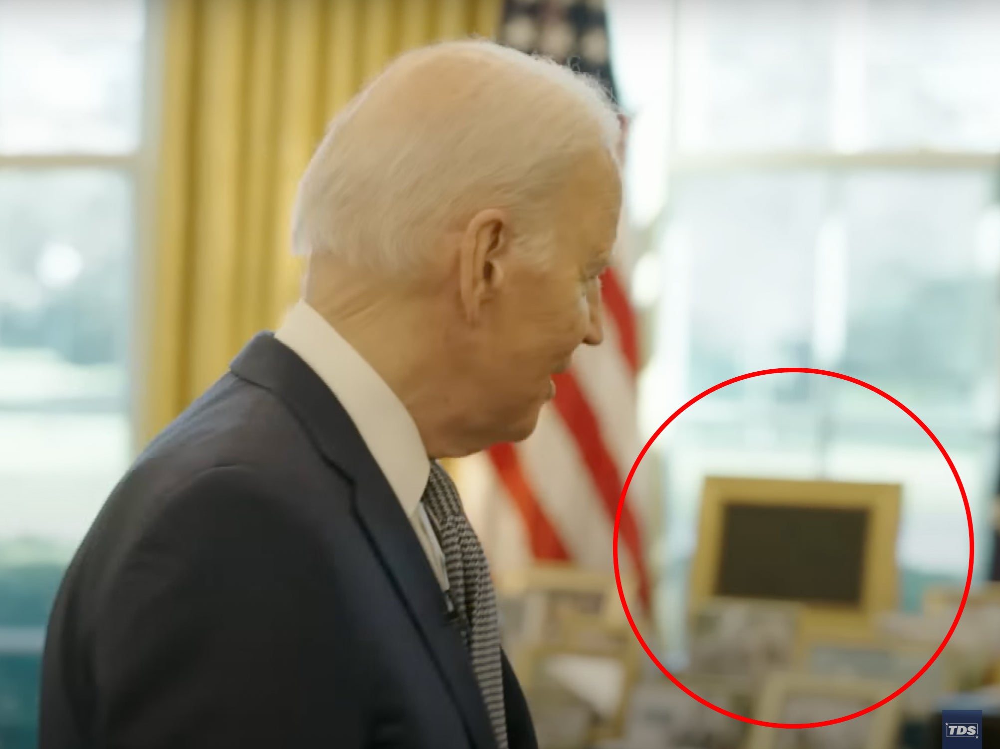 The apparent TV in a gold frame that President Biden is said to watch in the Oval Office