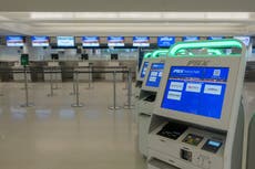 Woman arrested for ‘attacking airport staff over apple juice row’