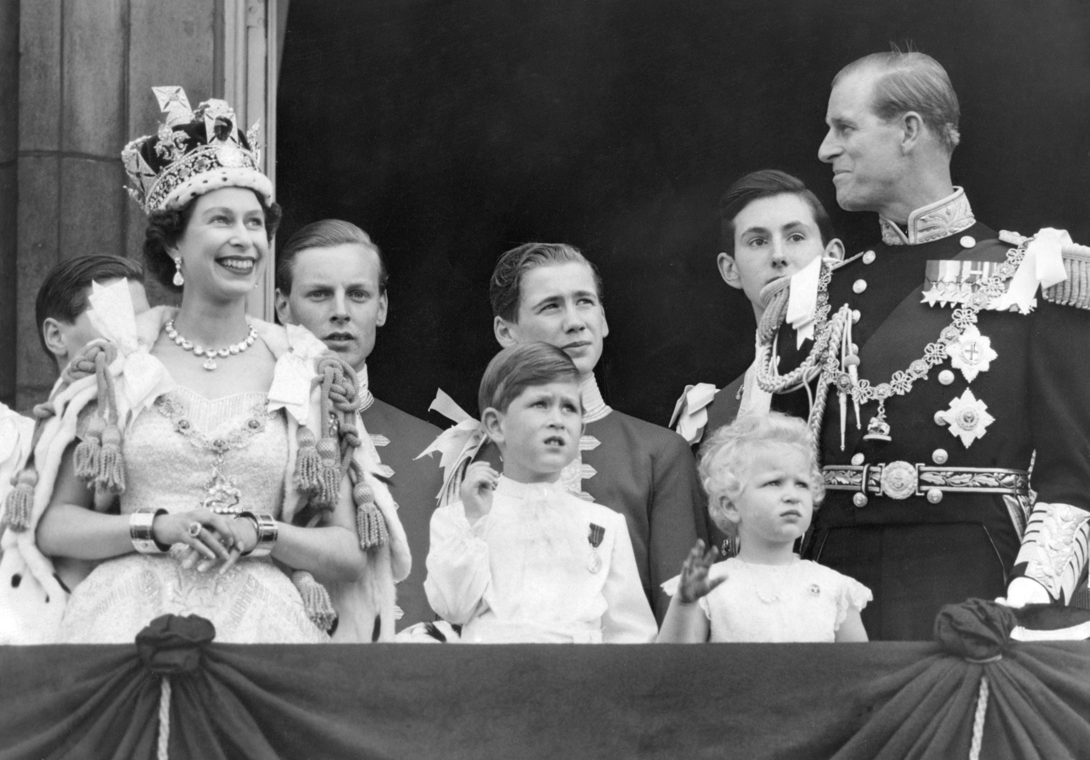 Queen Elizabeth II, Prince Charles, Princess Anne and the Duke of Edinburgh on the balcony at Buckingham Palace after the coronation at Westminster Abbey