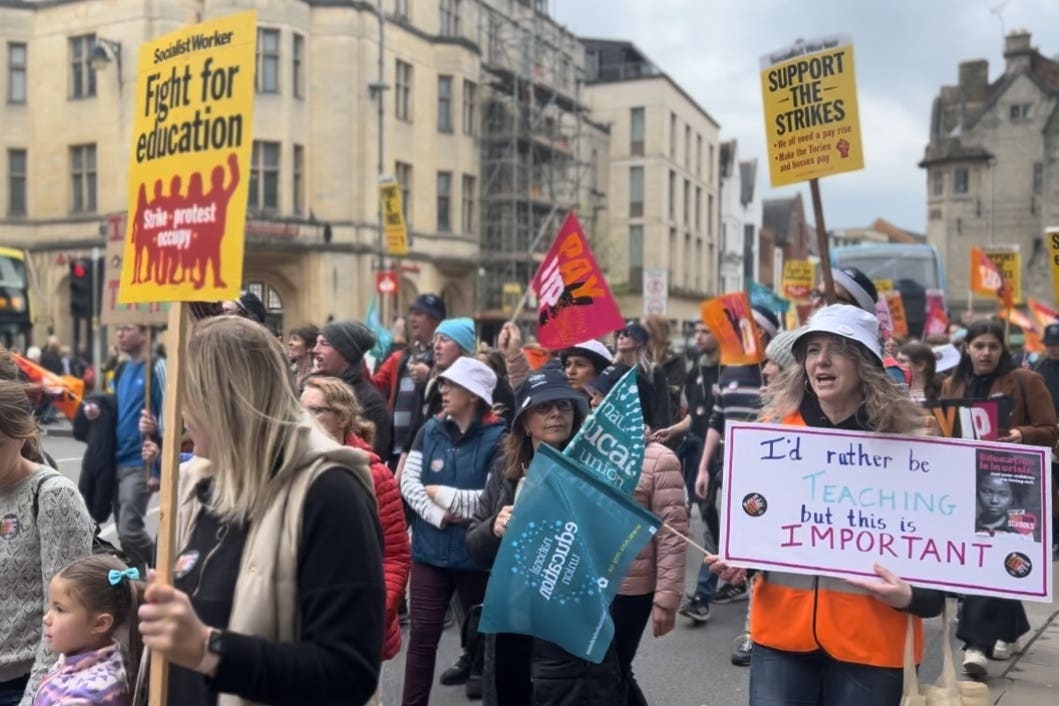 Members of the National Education Union (NEU) at a rally in Oxford, as they take strike action in a dispute over pay (Matilda Head/PA)