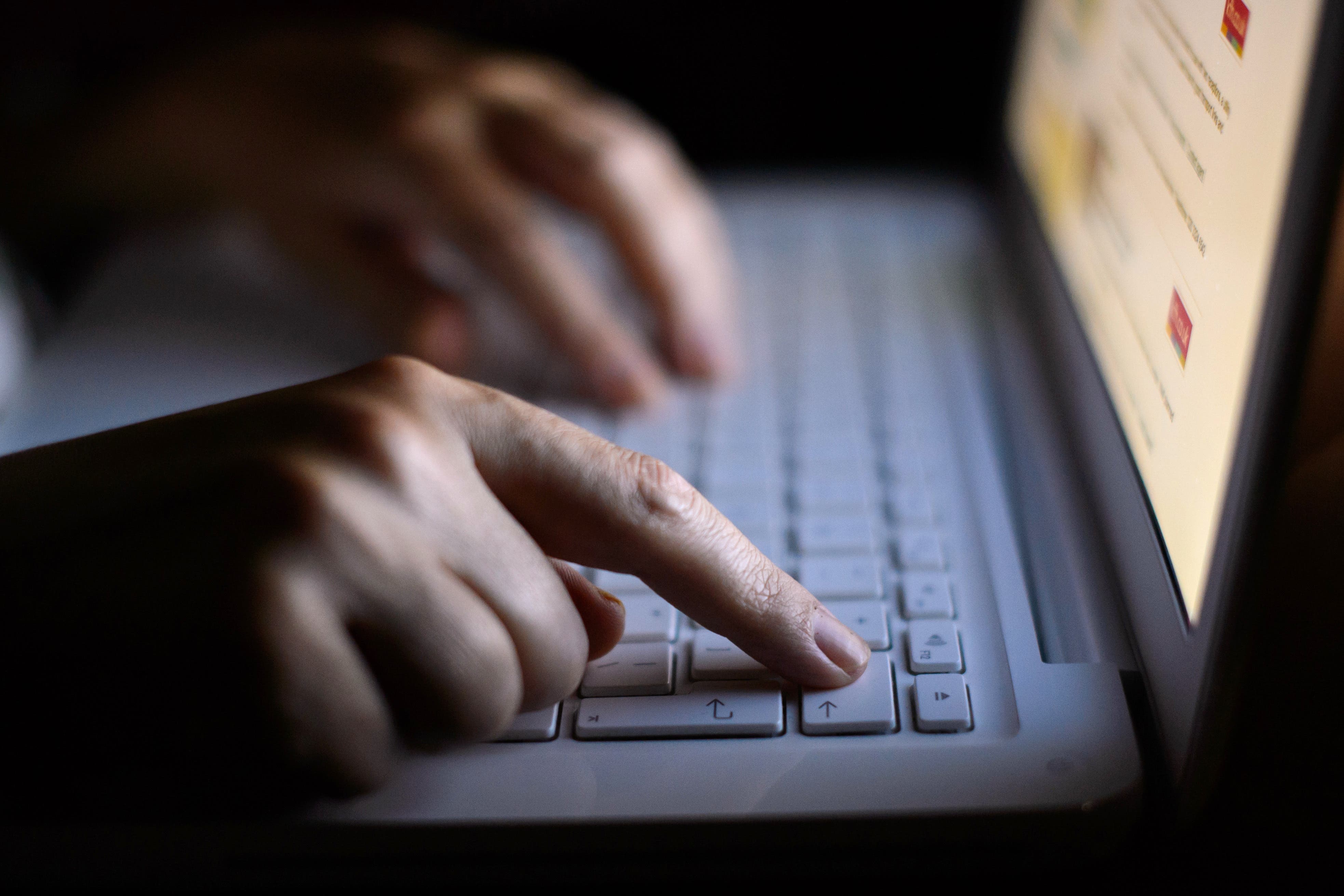 A woman using a laptop (Dominic Lipinski/PA)